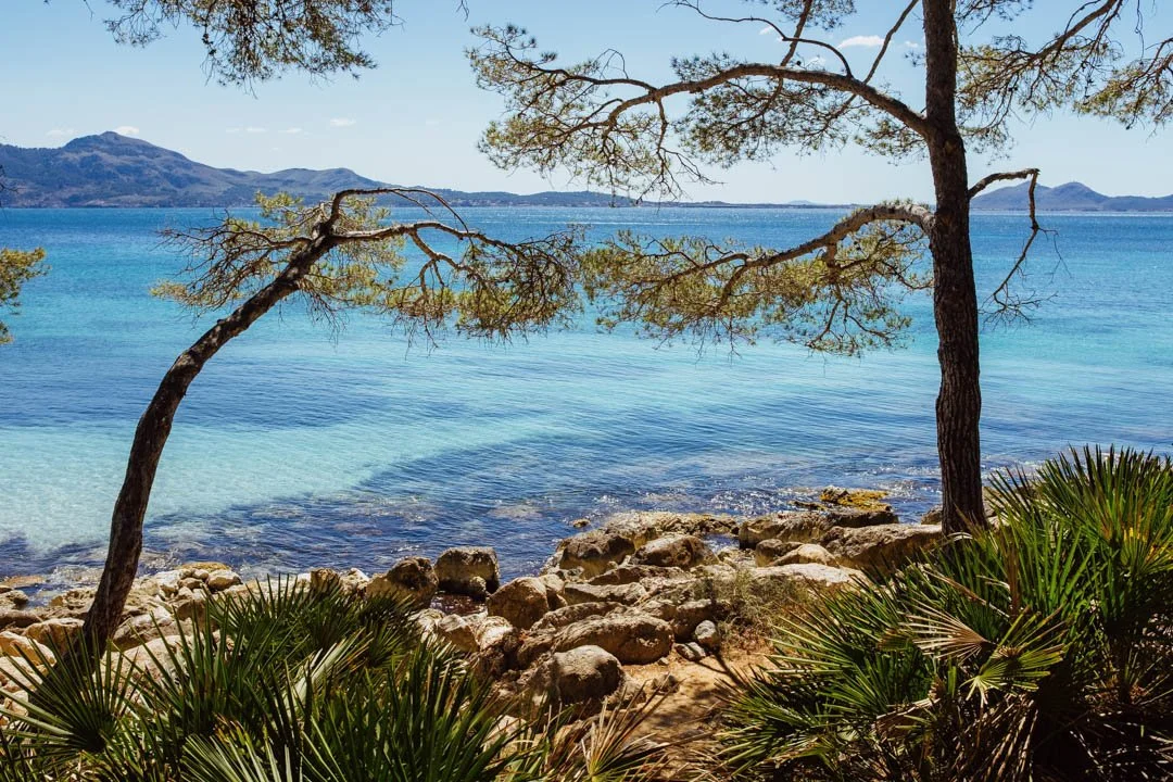 crystal water with golden sand beach, formentor peninsula
