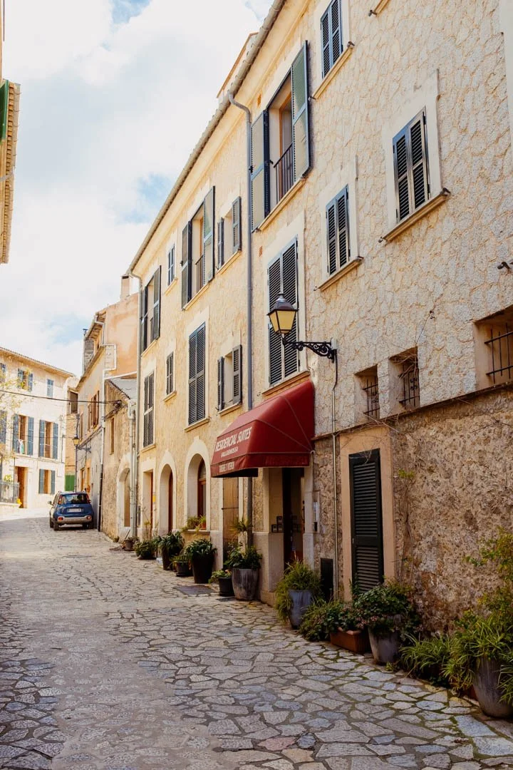 Valldemossa restaurant with red awning above door