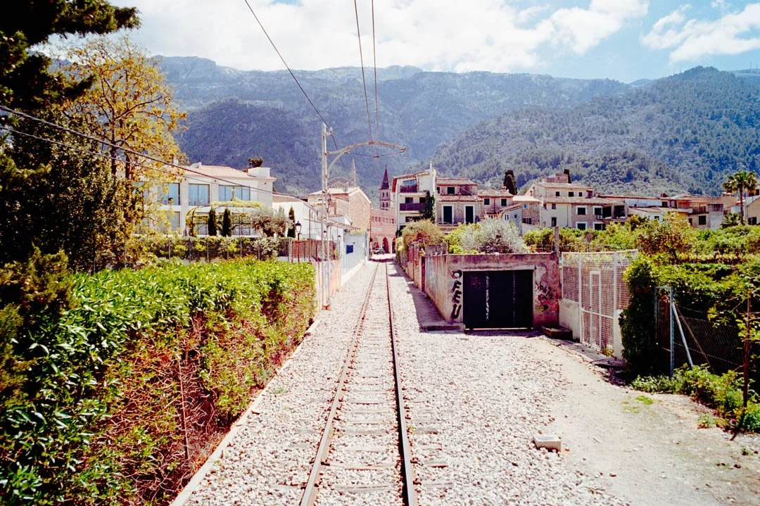 Soller trams with mountains in the backround