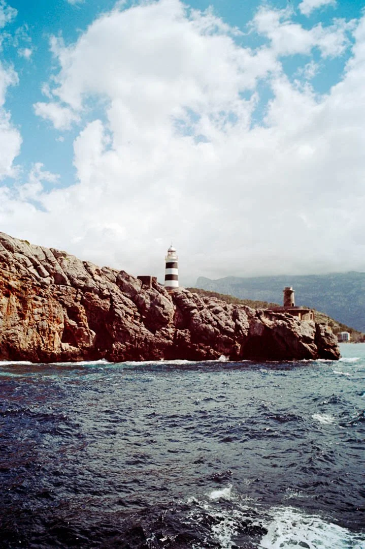 majorca lighthouse with cliffs and blue ocean