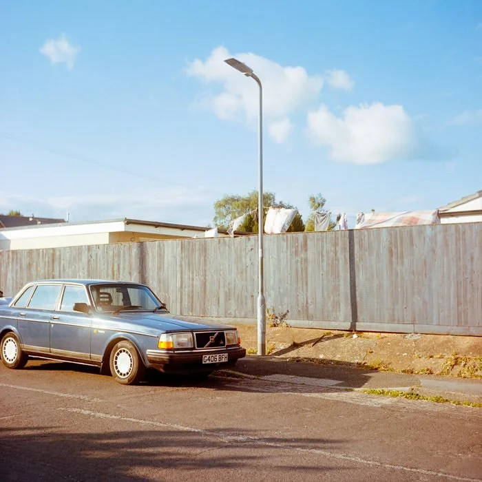 classic blue Volvo car in street, Yashica Mat 124G camera