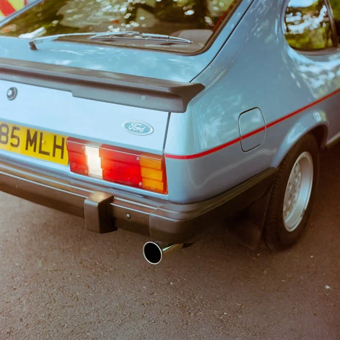 blue ford capri car with red stripe, Yashica mat-124 G