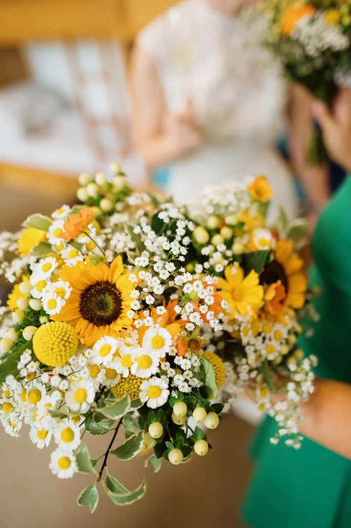 large bunch of yellow and white wedding flowers