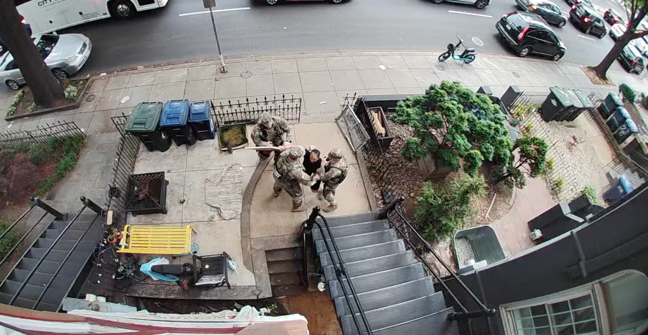 National Guard soldiers tackle woman to the ground, handcuff her outside her home