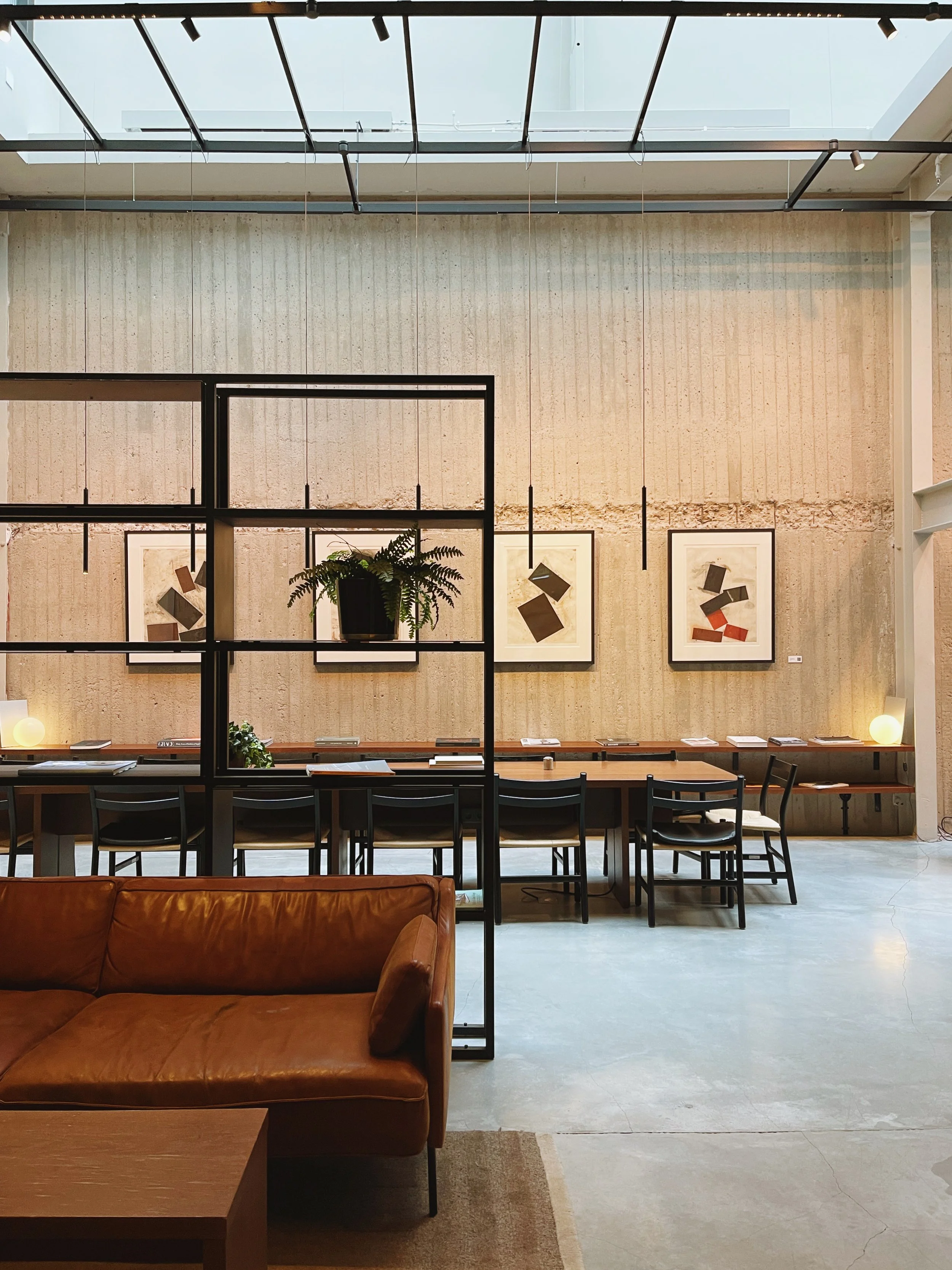 Restaurant and communal dining space at Blique by Nobis, Stockholm, Sweden, with minimalist Scandinavian interior design.