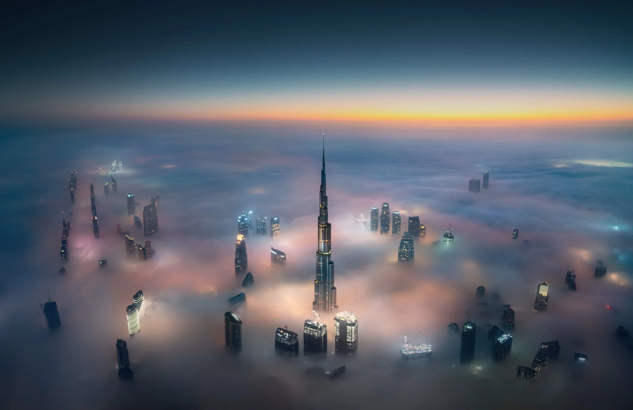burj-khalifa-aerial-fog-sunrise-and-dubai-skyline-sarab.jpg