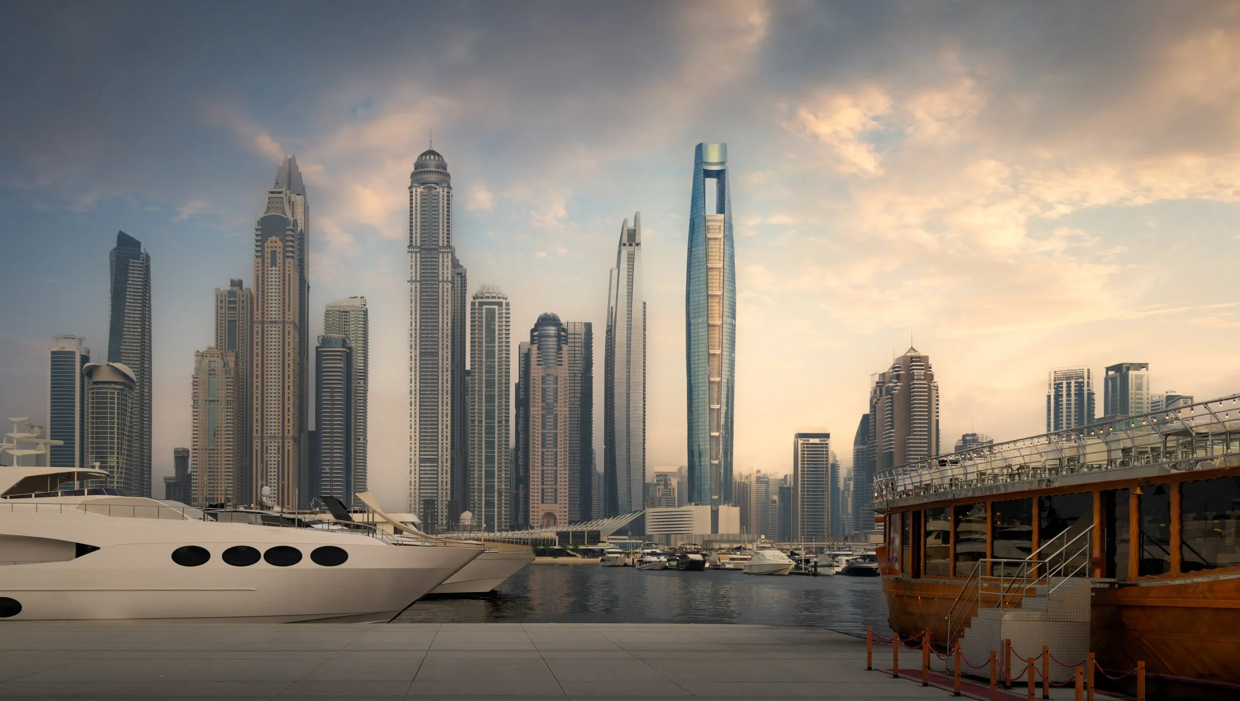 Ciel Dubai Marina above the marina skyline at sunset