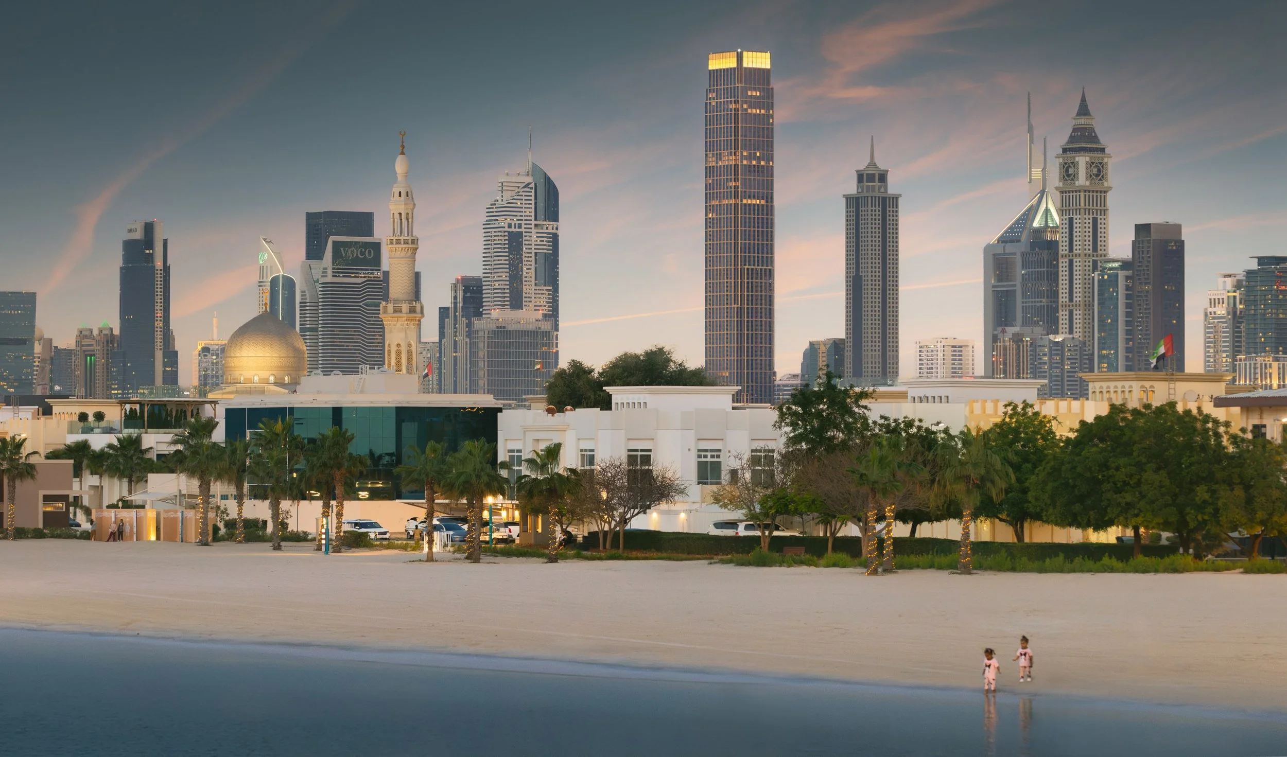 City Tower One at sunset above the Jumeirah beach.