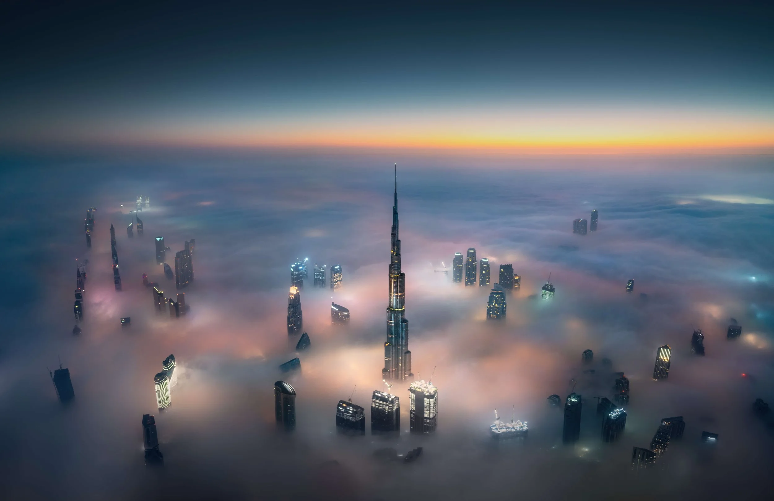 burj-khalifa-aerial-fog-sunrise-and-dubai-skyline-sarab.jpg