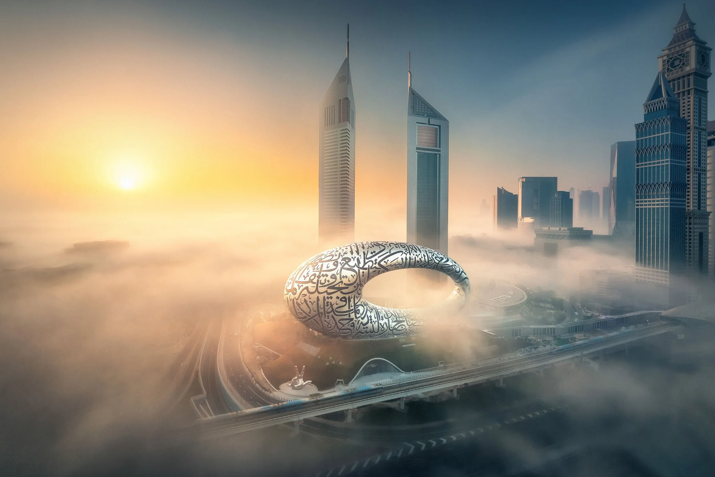 Museum of the Future in morning fog with Dubai skyscrapers — the iconic photograph shared by HH Sheikh Mohammed bin Rashid Al Maktoum, by Ahmad Alnaji, SARAB Art Production