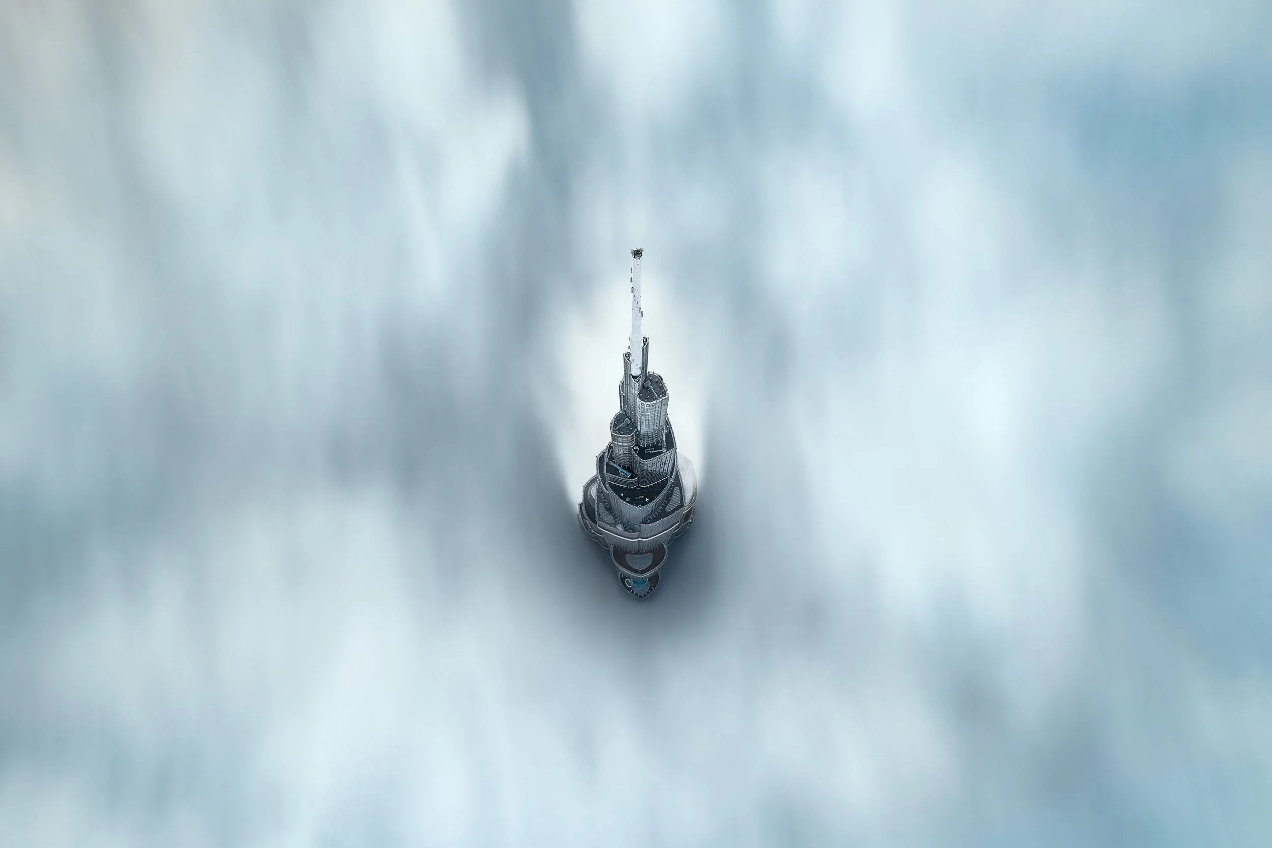 Burj Khalifa rare aerial view above the fog at morning, Dubai — fine art drone photograph by khalid alhammadi, SARAB Art Production