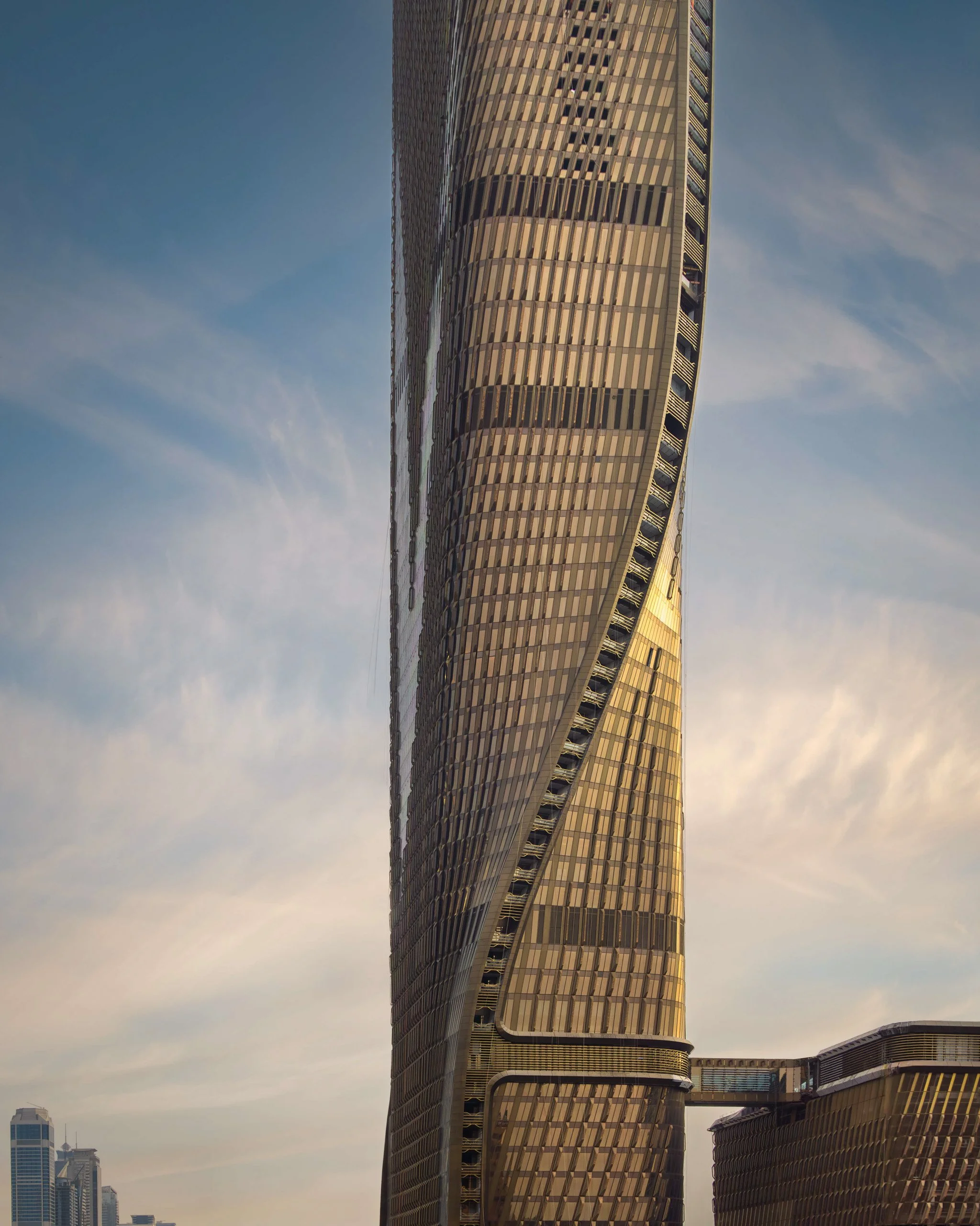 wasl-tower-golden-hour-ceramic-fins-terracotta-uns-sarab.jpg