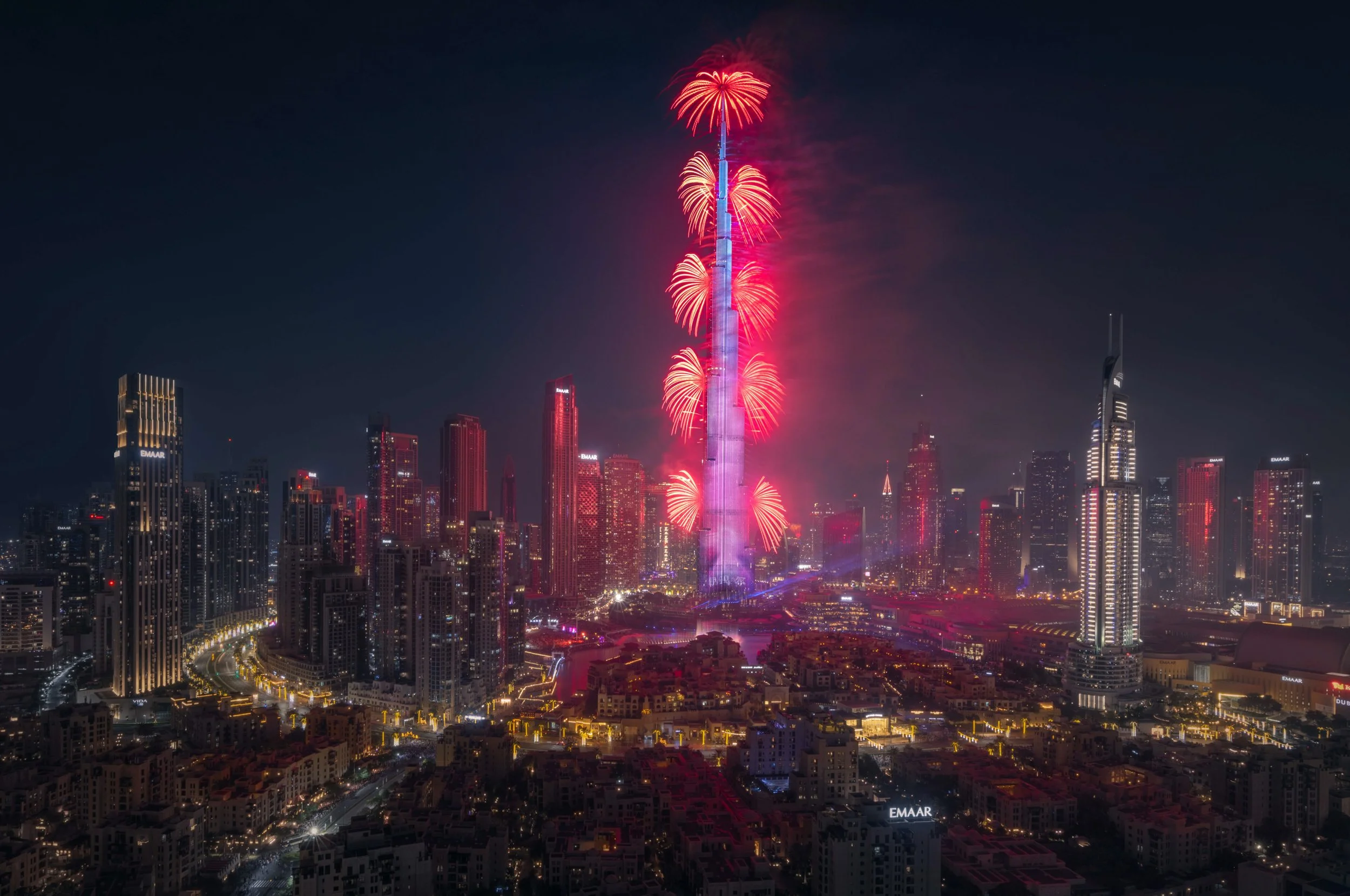 Burj Khalifa New Year's Eve light and fireworks show viewed from south ridge Downtown Hotel, Emaar Dubai — fine art photograph by Ahmad Alnaji, SARAB Art Production