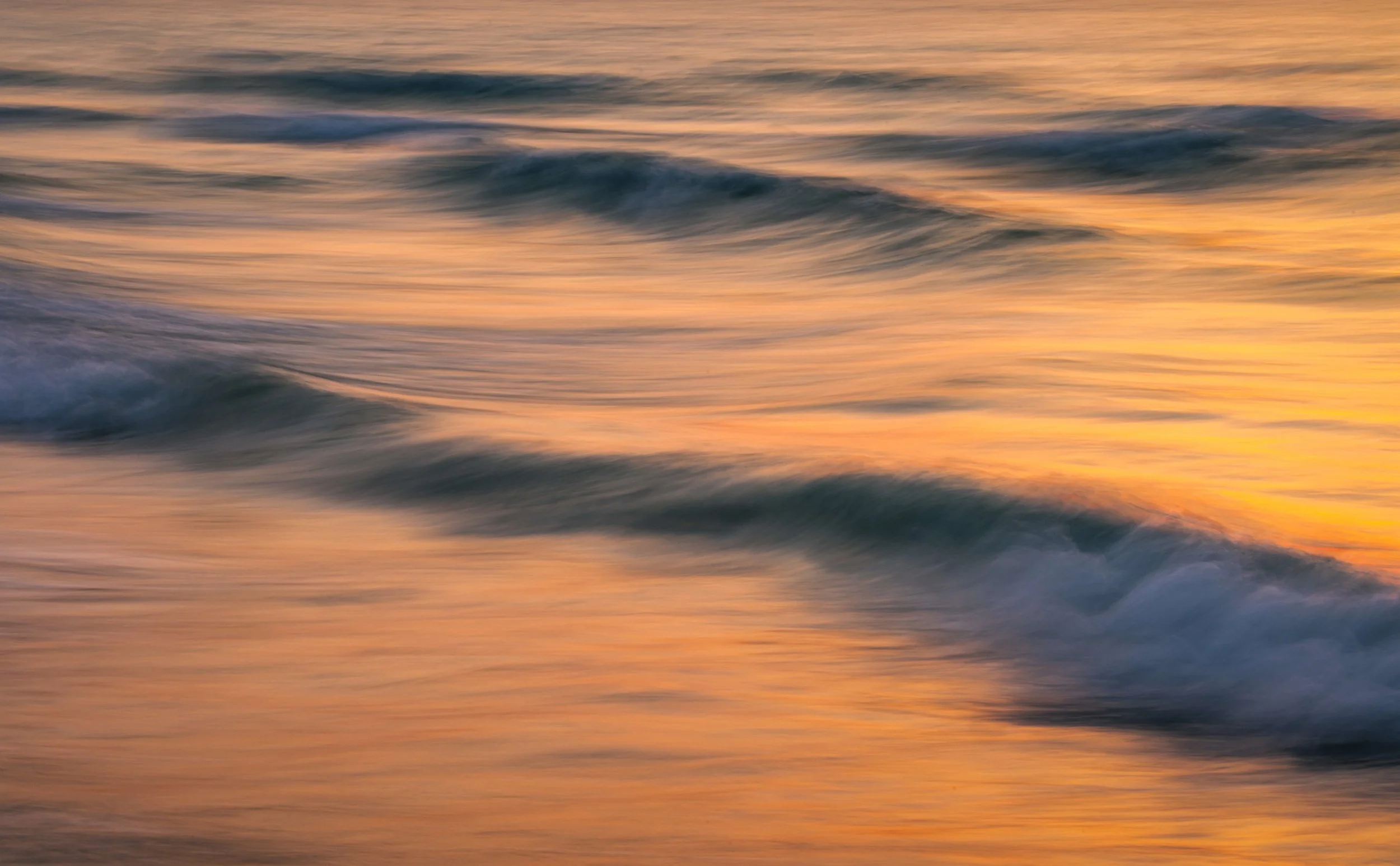 abstract-ocean-waves-motion-blur-sunset-uae-sarab.jpg