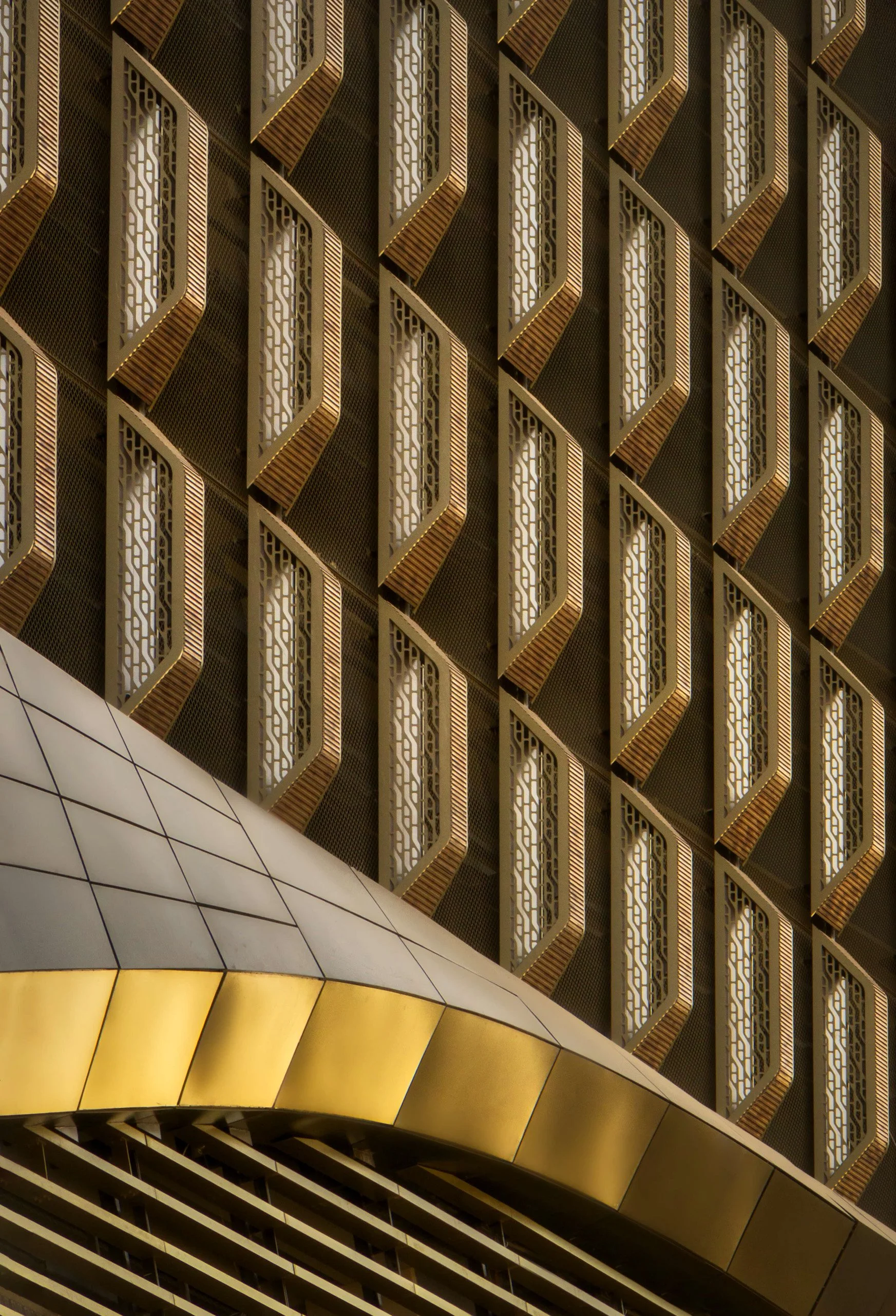 wasl-tower-ceramic-golden-fin-facade-detail-uns-terracotta-sarab-ahmad-alnaji.jpg