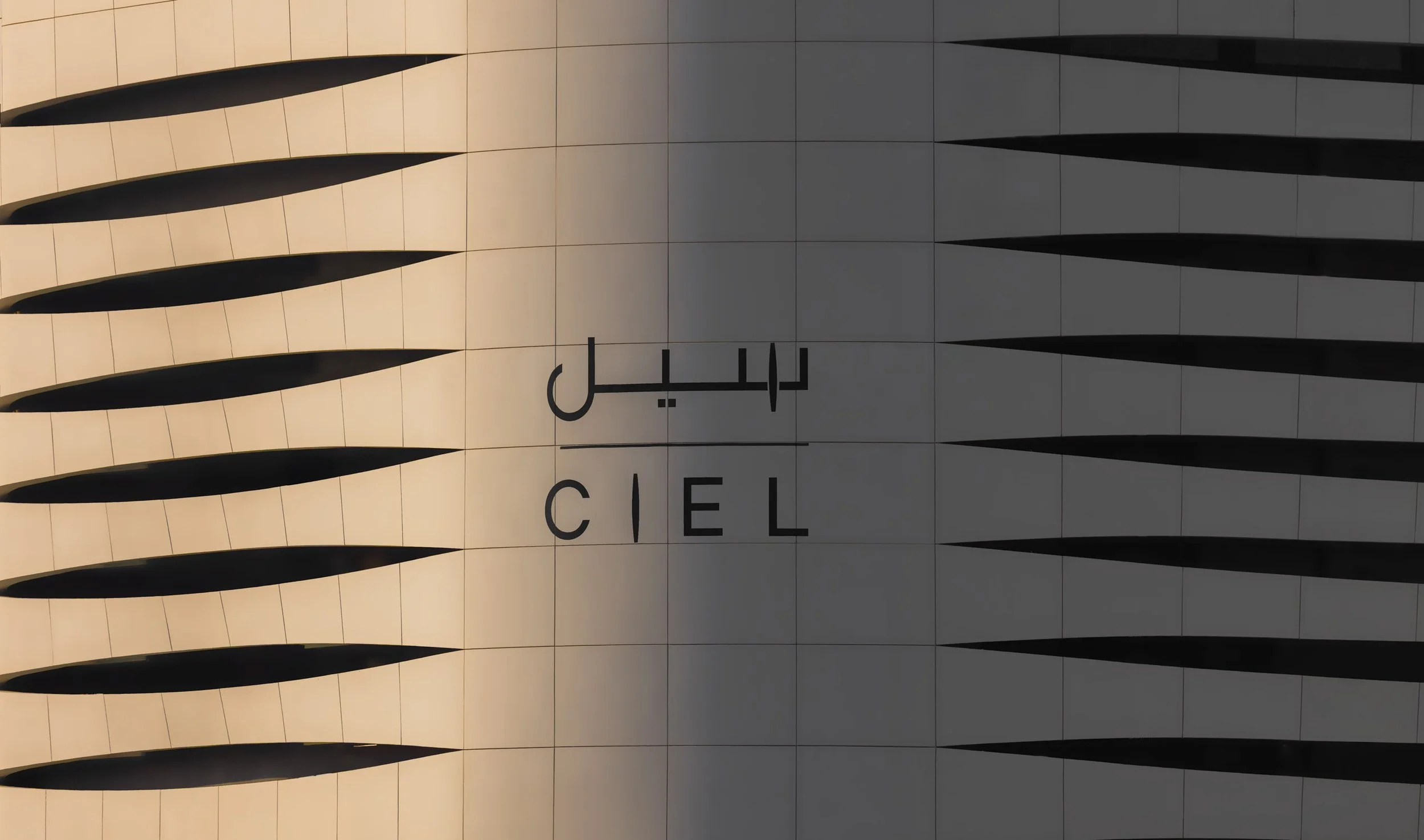 Ciel Dubai Marina by NORR podium at sunset, with the hotel logo centered. 