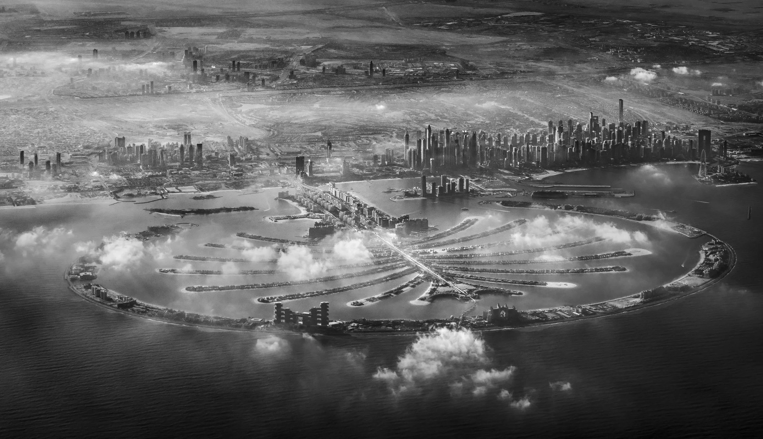 sarab-ahmad-alnaji-palm-jumeirah-aerial-clouds-dubai.jpg