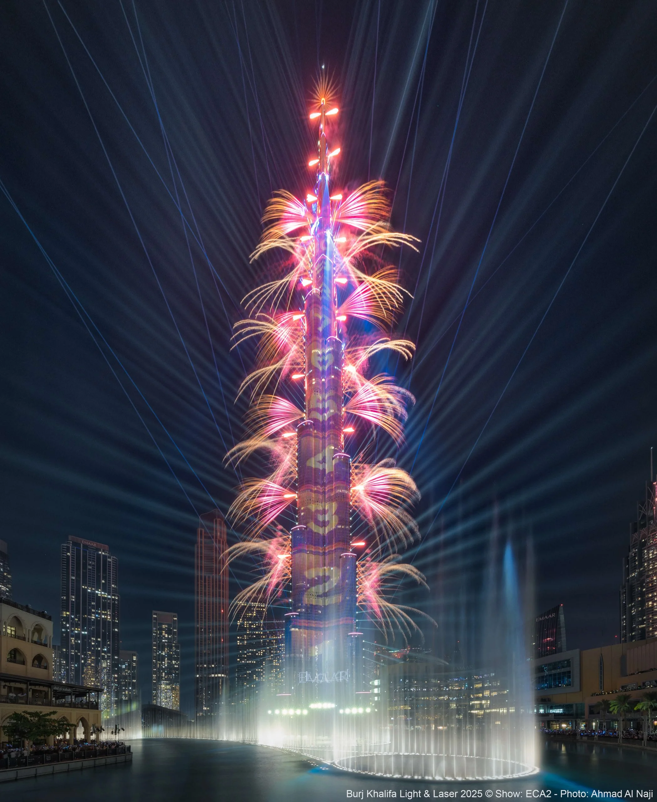 Burj Khalifa New Year's Eve fireworks display from bridge perspective, Dubai — fine art architectural photograph by Ahmad Alnaji, SARAB Art Production