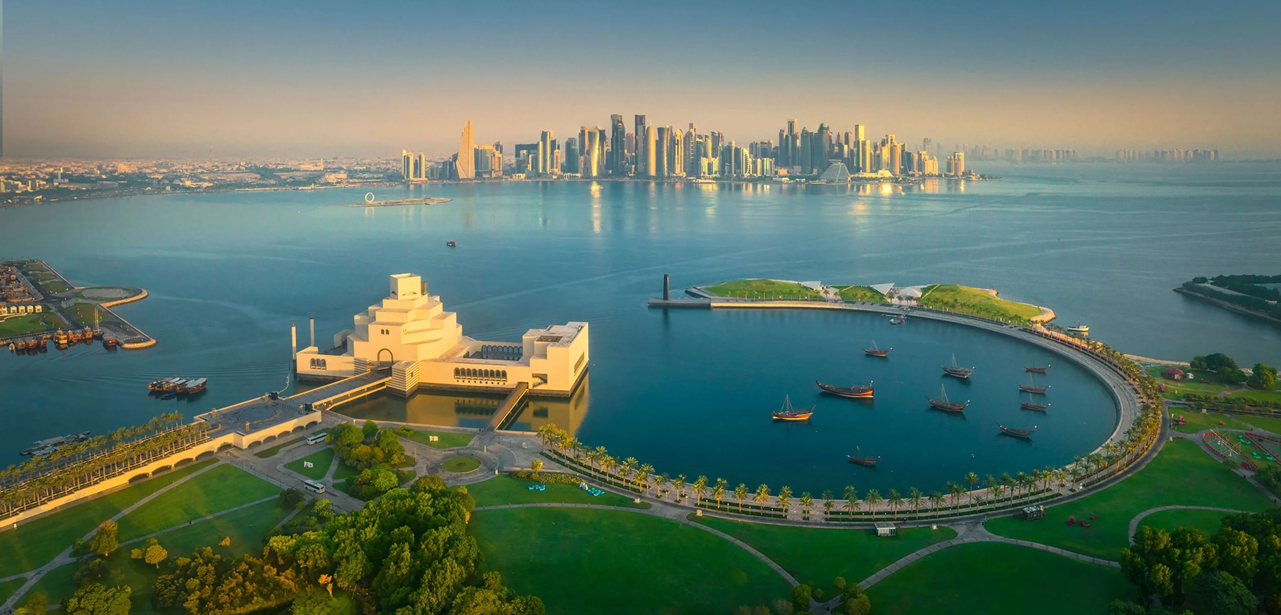 Museum-of-islamic-art-MIA-qatar-aerial-view-with-doha-skyline-sarab-Ahmad-Alnaji-.jpg