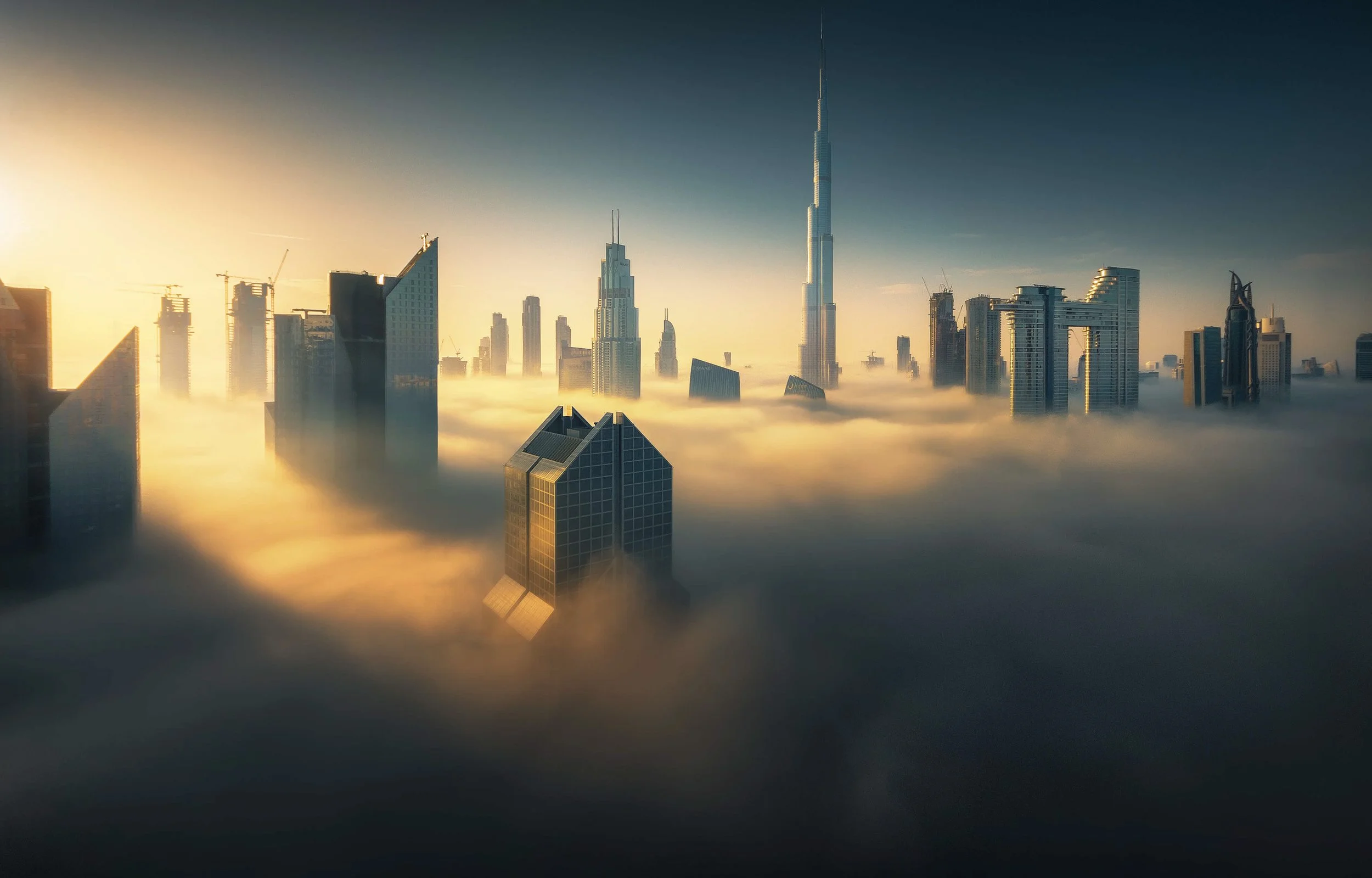 burj-khalifa-sunrise-fog-downtown-dubai-skyline-dubai-sarab-ahmad-alnaji.jpg