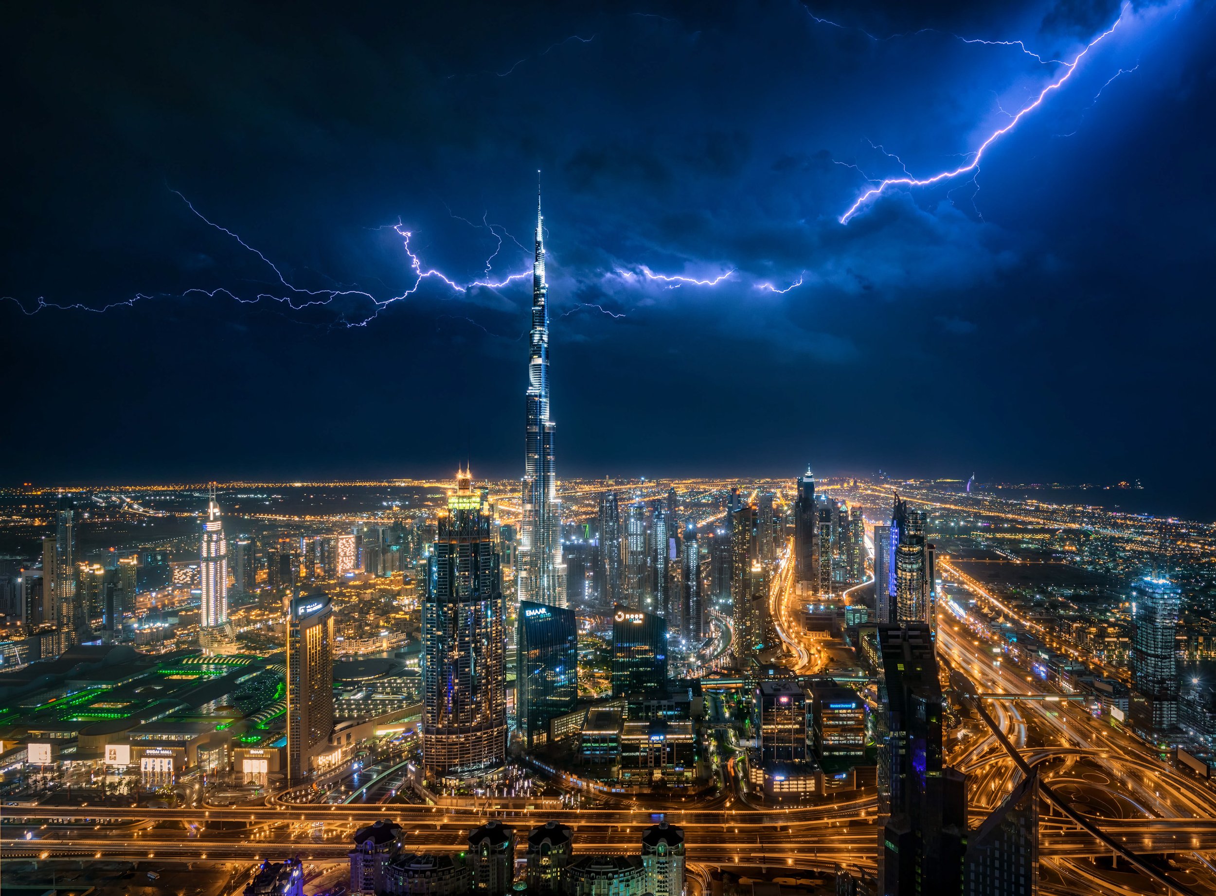 burj-khalifa-night-thunderstorm-lightning-dubai-skyline-fine-art-ahmad-alnaji.jpg