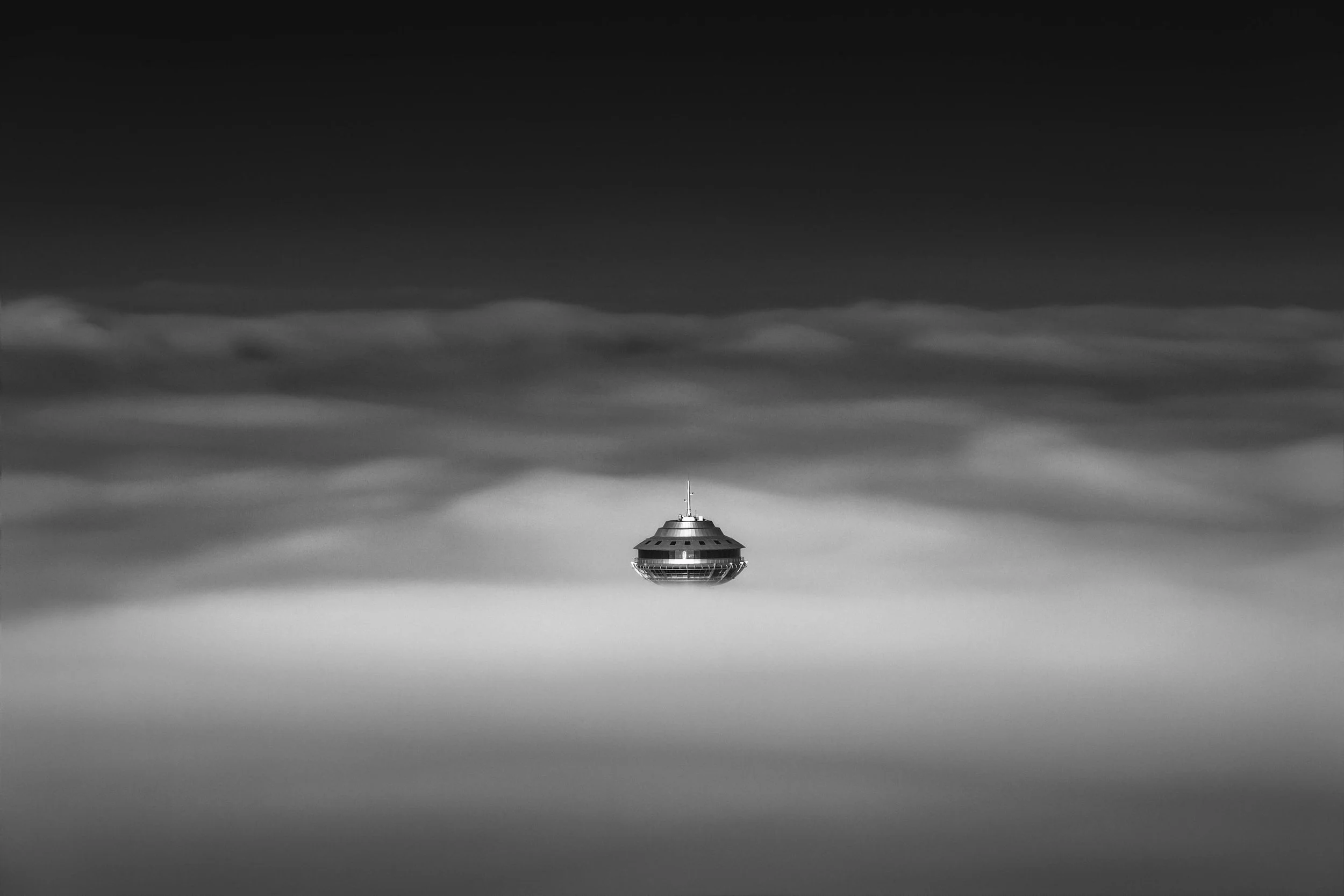 Marina-tower-futuristic-disc-structure-floating-fog-uae-sarab.jpg