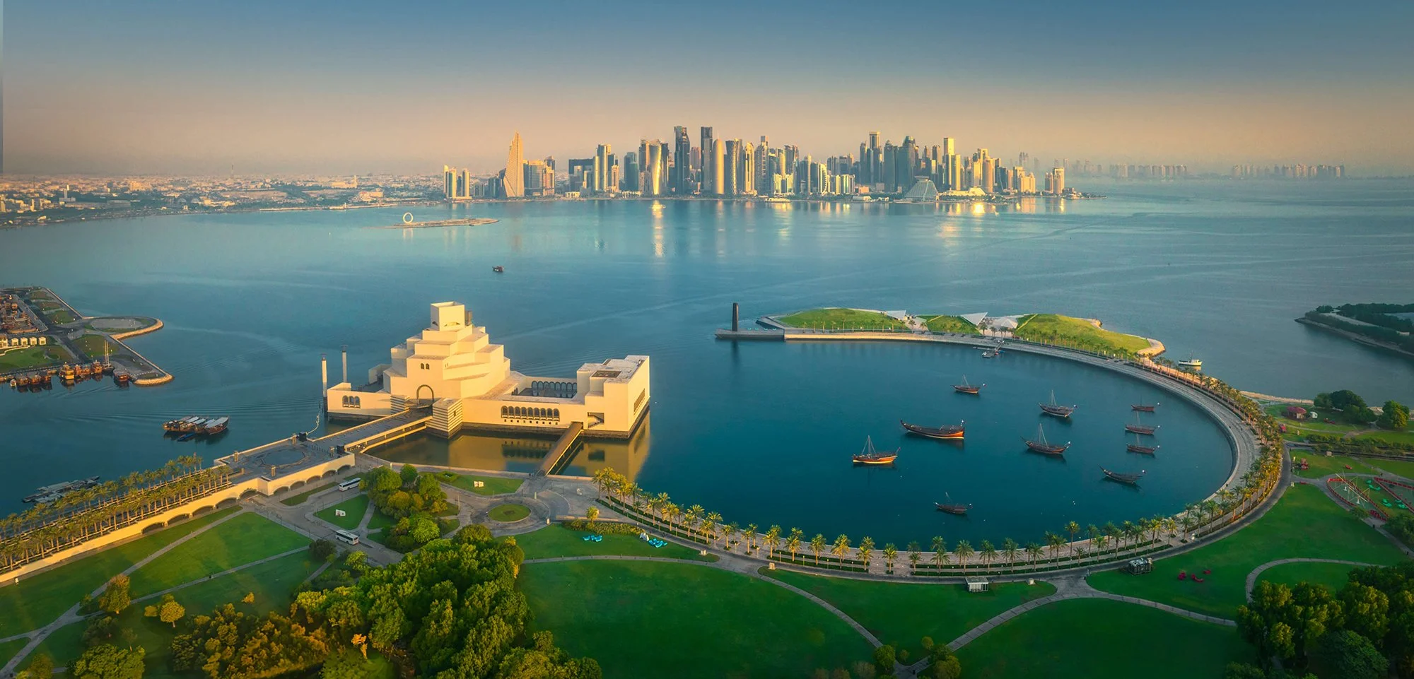 Museum-of-islamic-art-MIA-qatar-aerial-view-with-doha-skyline-sarab-Ahmad-Alnaji-.jpg