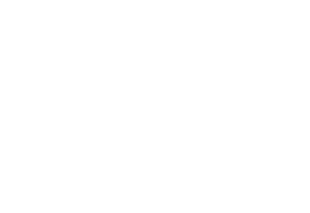 A gavel resting on a stack of books.