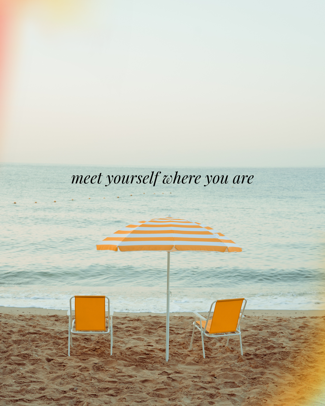 A beach scene with two yellow lounge chairs under an orange and white striped umbrella, facing the ocean. The sky is clear, and there is a quote that says "meet yourself where you are."