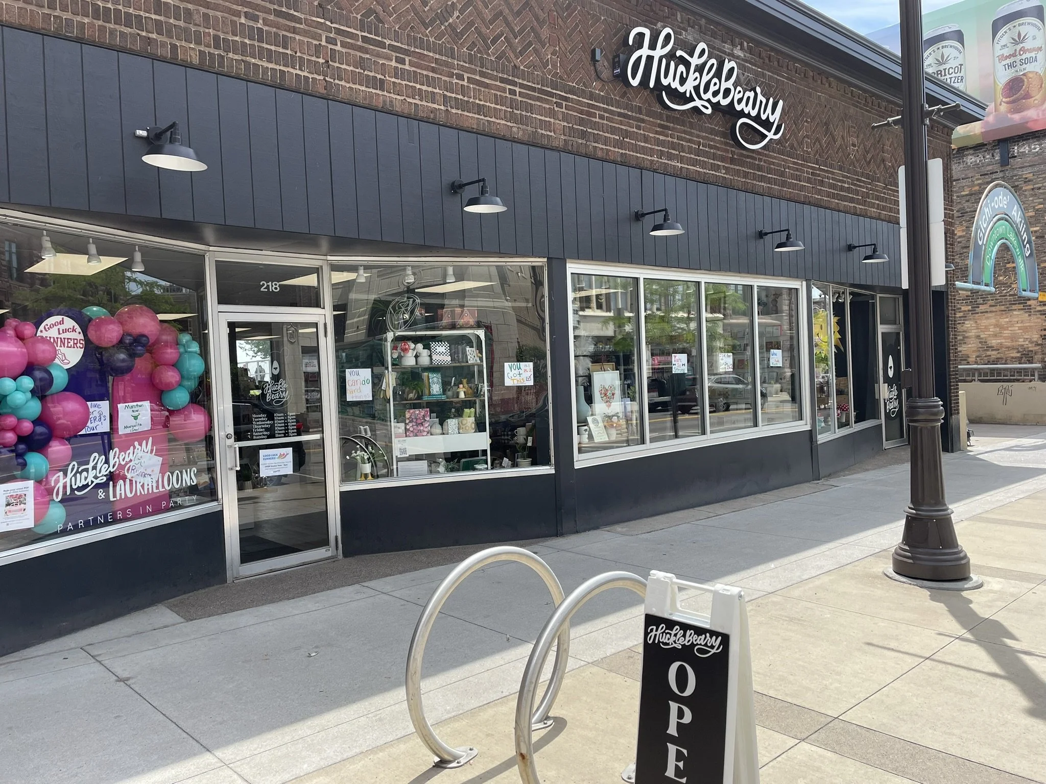 image of Hucklebeary storefront on Superior Street in Duluth Mn. a gift and party shop that partners will Lauralloons balloons