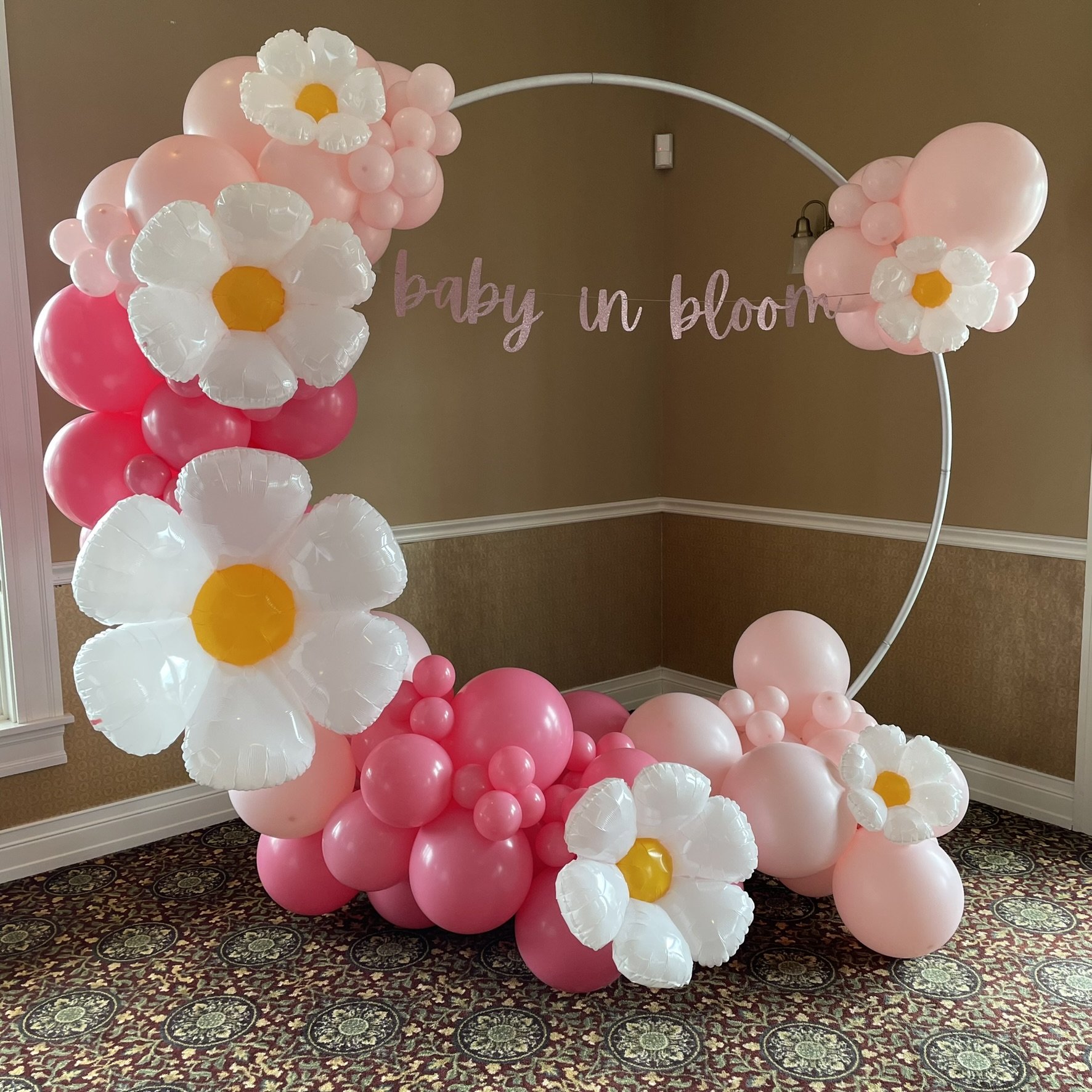 Baby in bloom partial coverage circle arch.JPEG