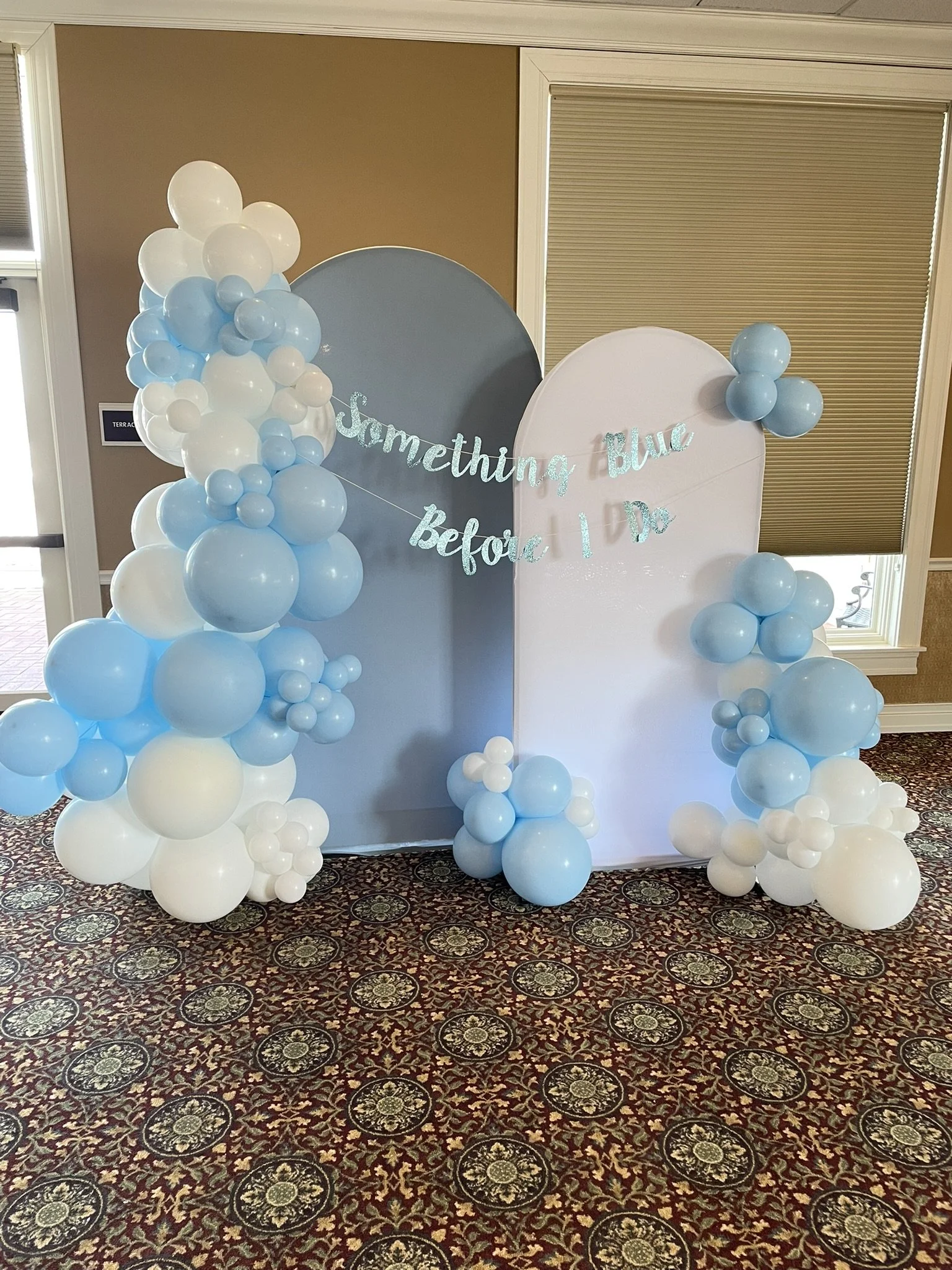 something blue before i do dusty blue and white arched backdrops.JPEG