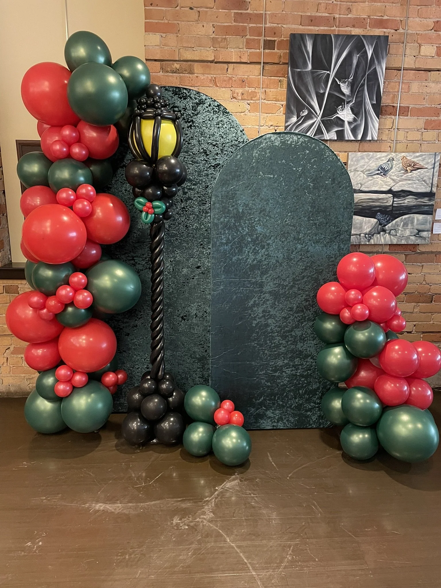 Christmas Balloon Garlands with Arched Backdrops and Lamppost.JPEG
