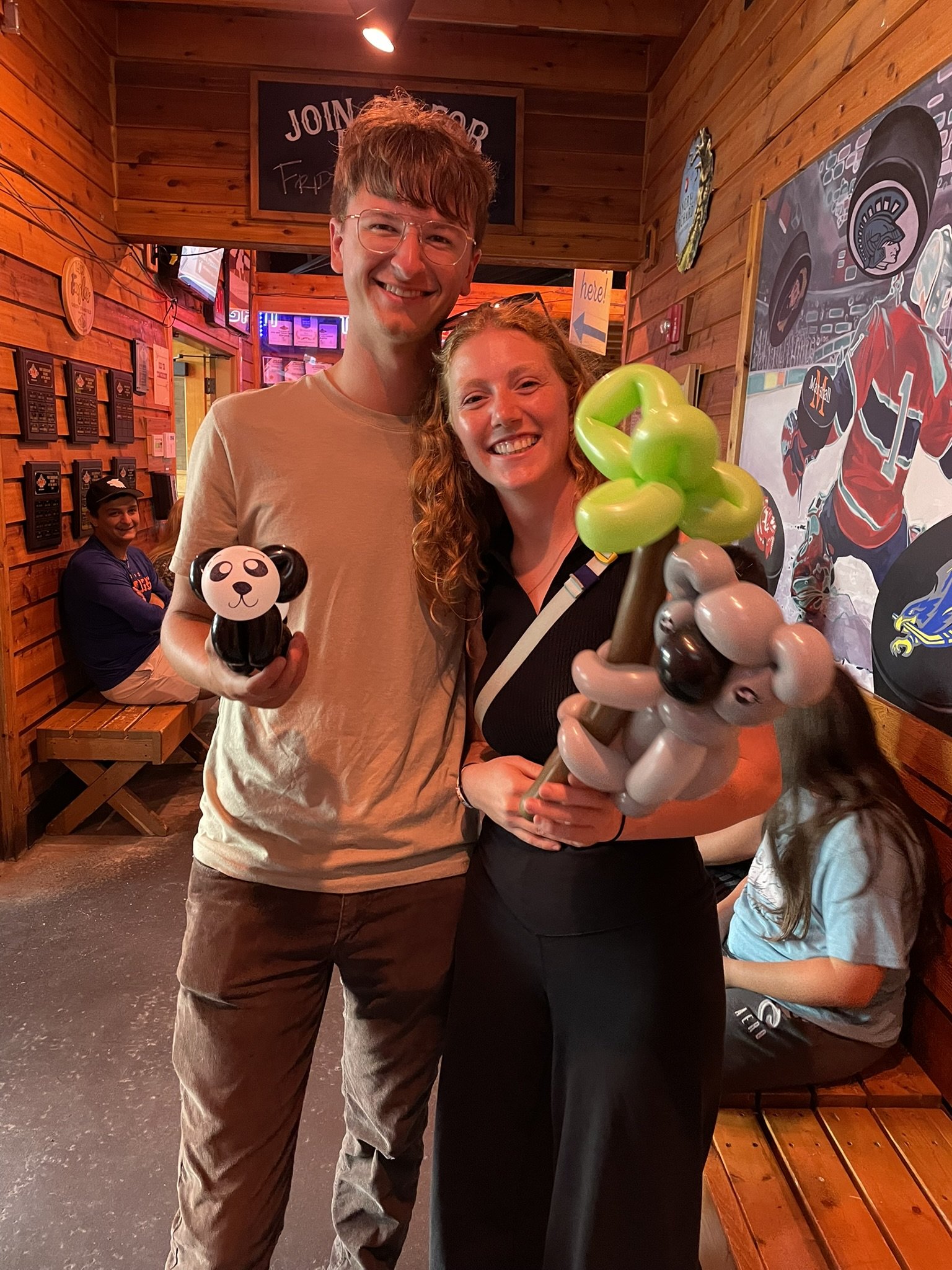 cute couple with balloon animals.JPEG