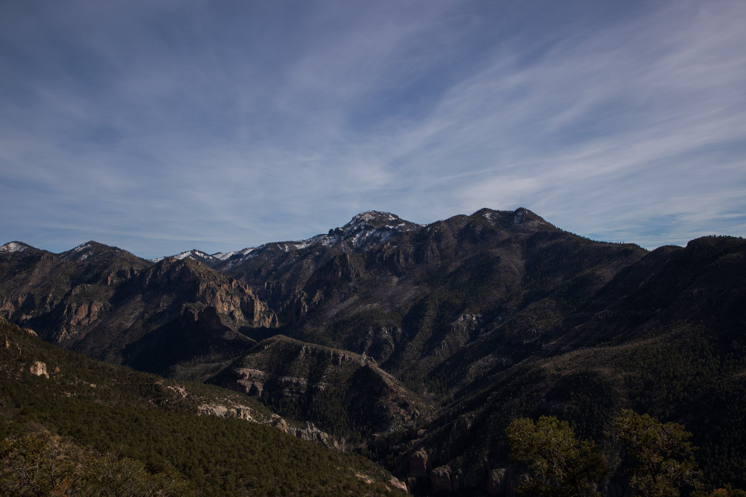 Mountain landscape with rugged peaks and clear sky