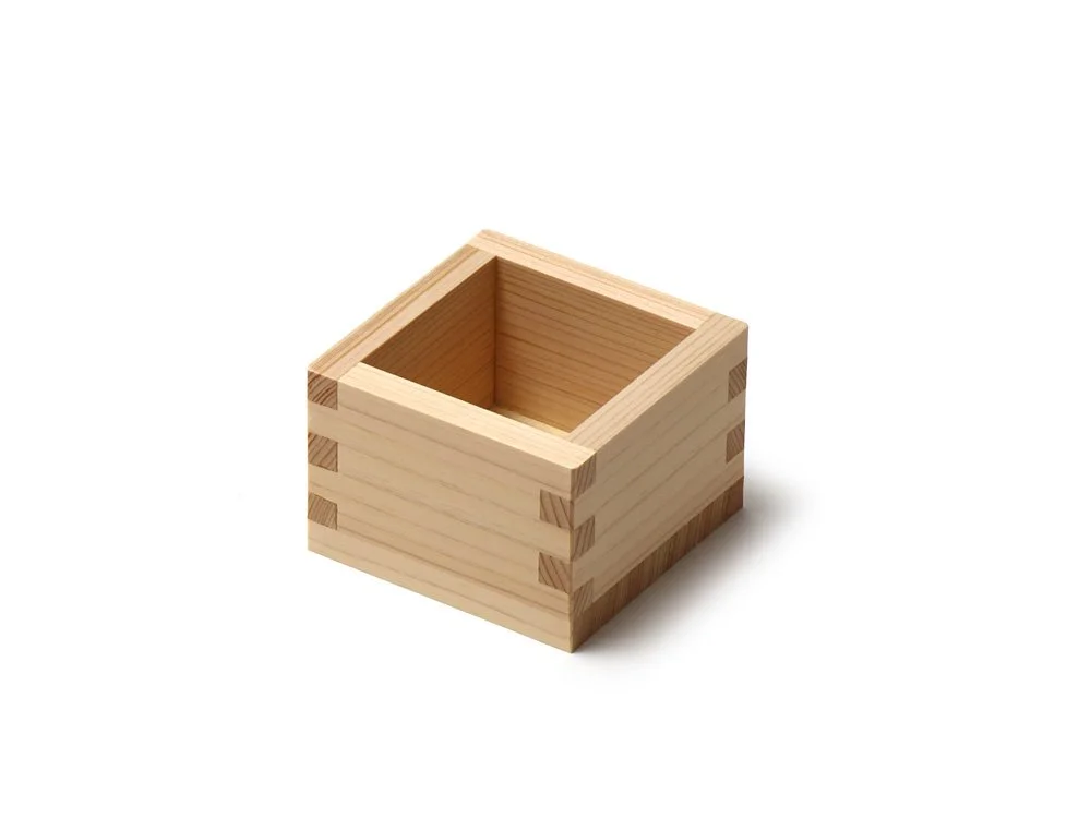 Traditional wooden sake cup (masu)