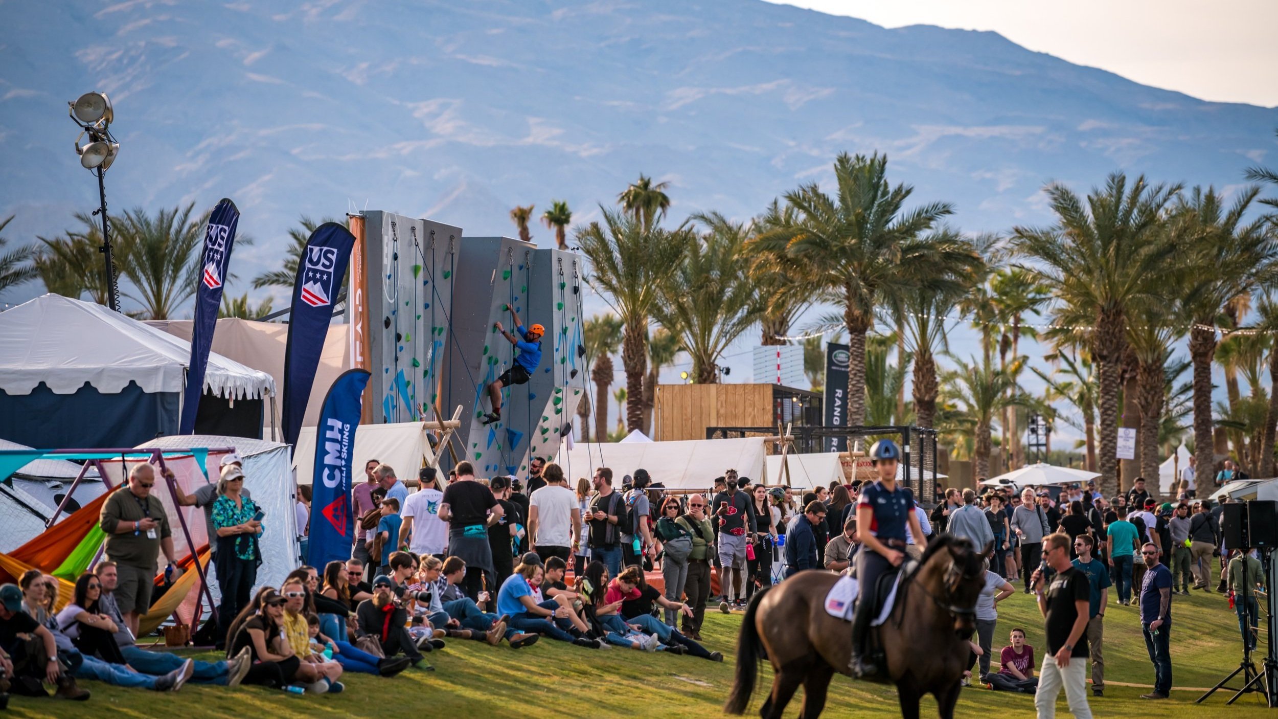 We used this opportunity to lean into long-standing brand partnerships and magical juxtapositions. Where else could you find USA Olympic equestrian athletes mingling amongst fans waiting to engage in high-end outdoor activities such as rock climbing,