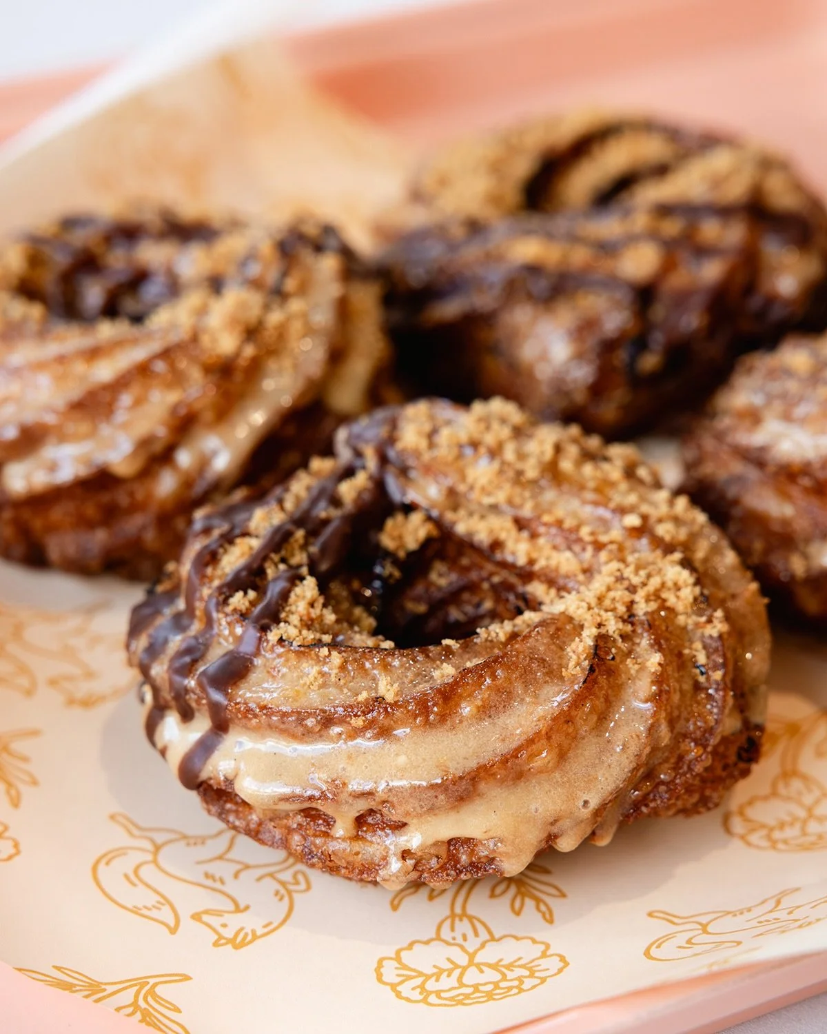 S&rsquo;mores but a donut?! Yes, we absolutely created the most decadent of toasted marshmallow glaze goodness, sprinkled with browned butter graham crumb and drizzled with chocolate glaze. On our menu through Saturday! We look forward to seeing you 