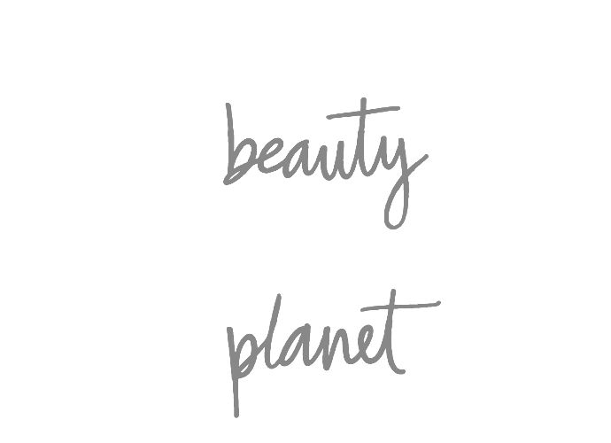 Inspirational quote reading 'Love beauty and planet' with stylized text on a black background.