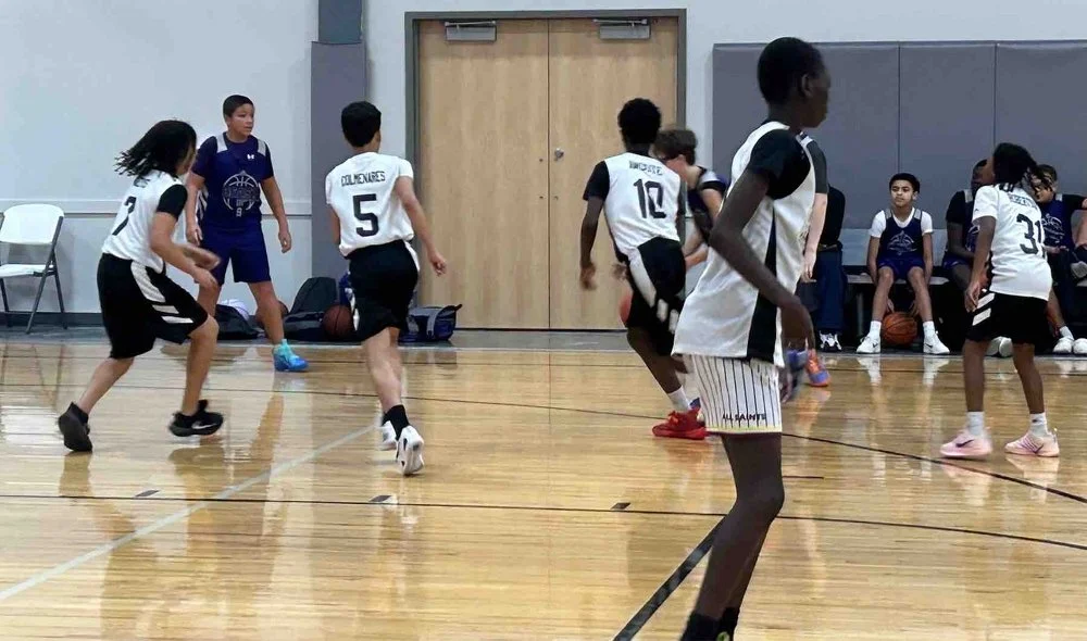 NBA players playing defense during game