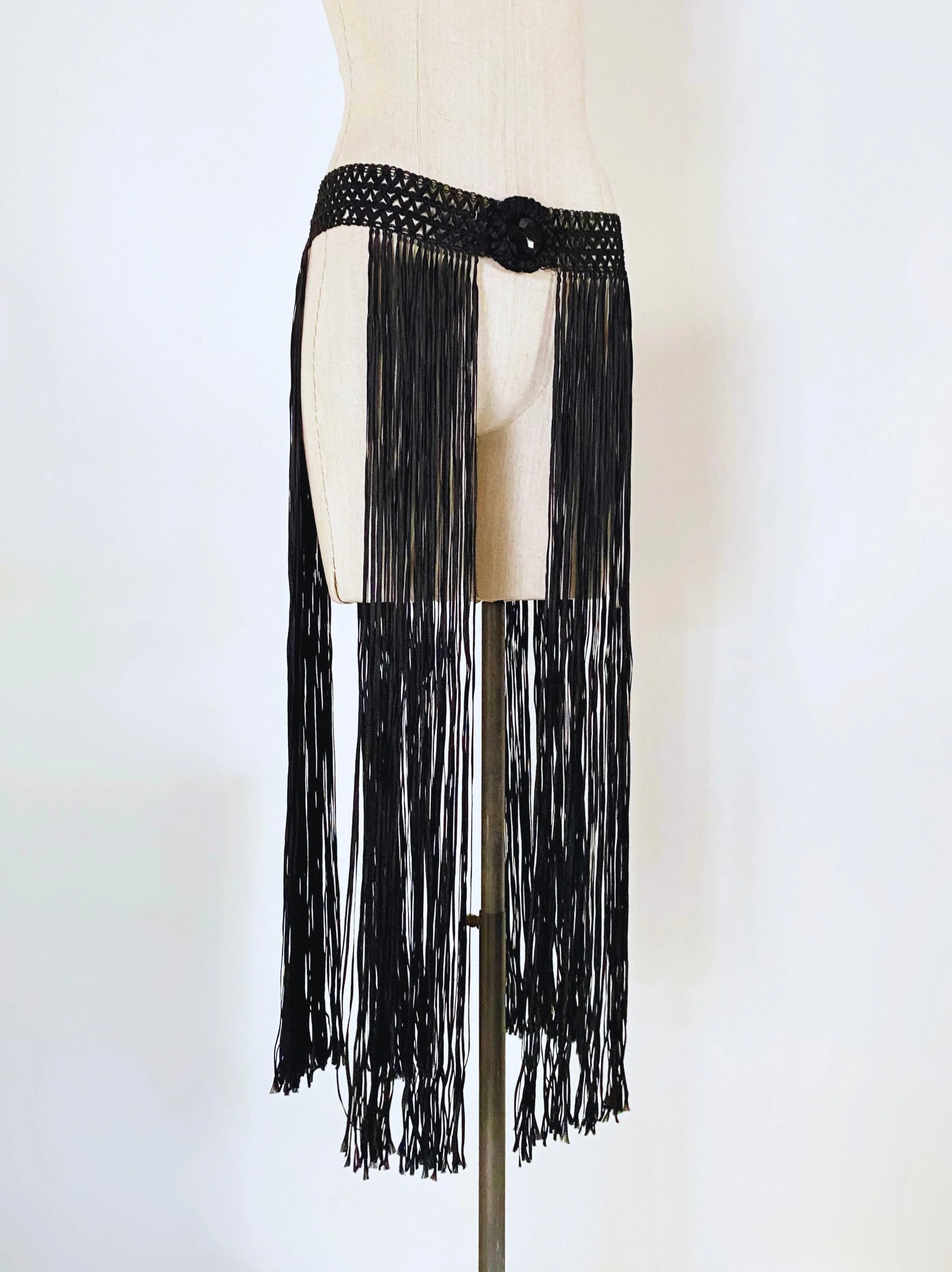 1920&rsquo;s silk fringes belt 

Vintage pieces available for professional rental.
Rare finds and statement pieces selected for editorials, campaigns, fashion shoots and creative projects.
Full catalogue available on request: contact@estherarchives.c