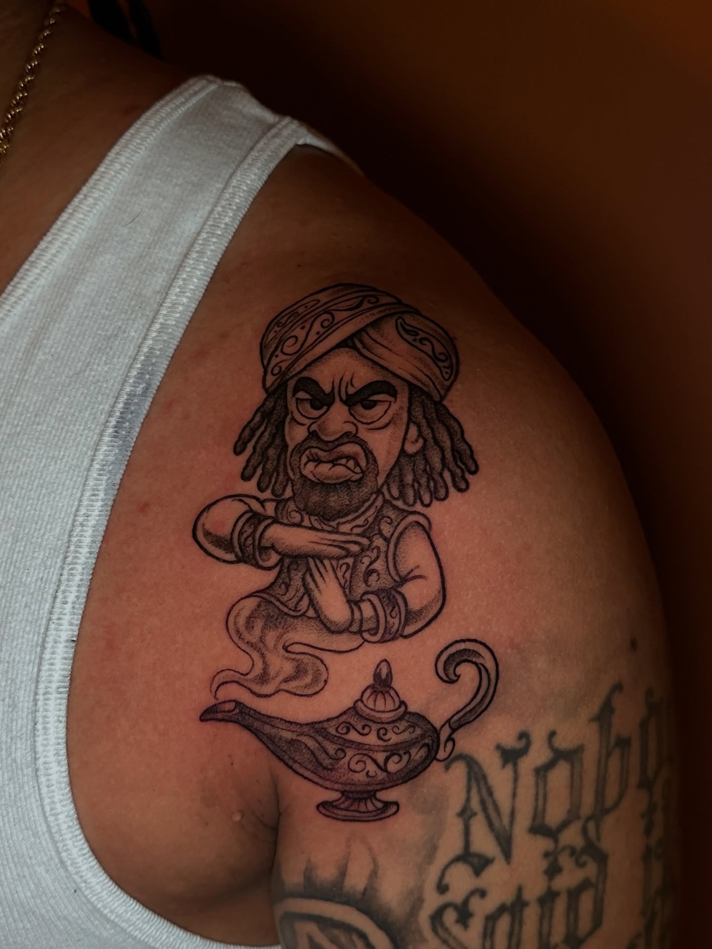 Birthday tattoos are the best 💯thanks for bringing your booski in @big.mommasbraids_ 
.
.
.
.
.
.
#fresnotattoos #macdre #birthdaytattoo #genieofthelamp #notmyjob #559tattoos