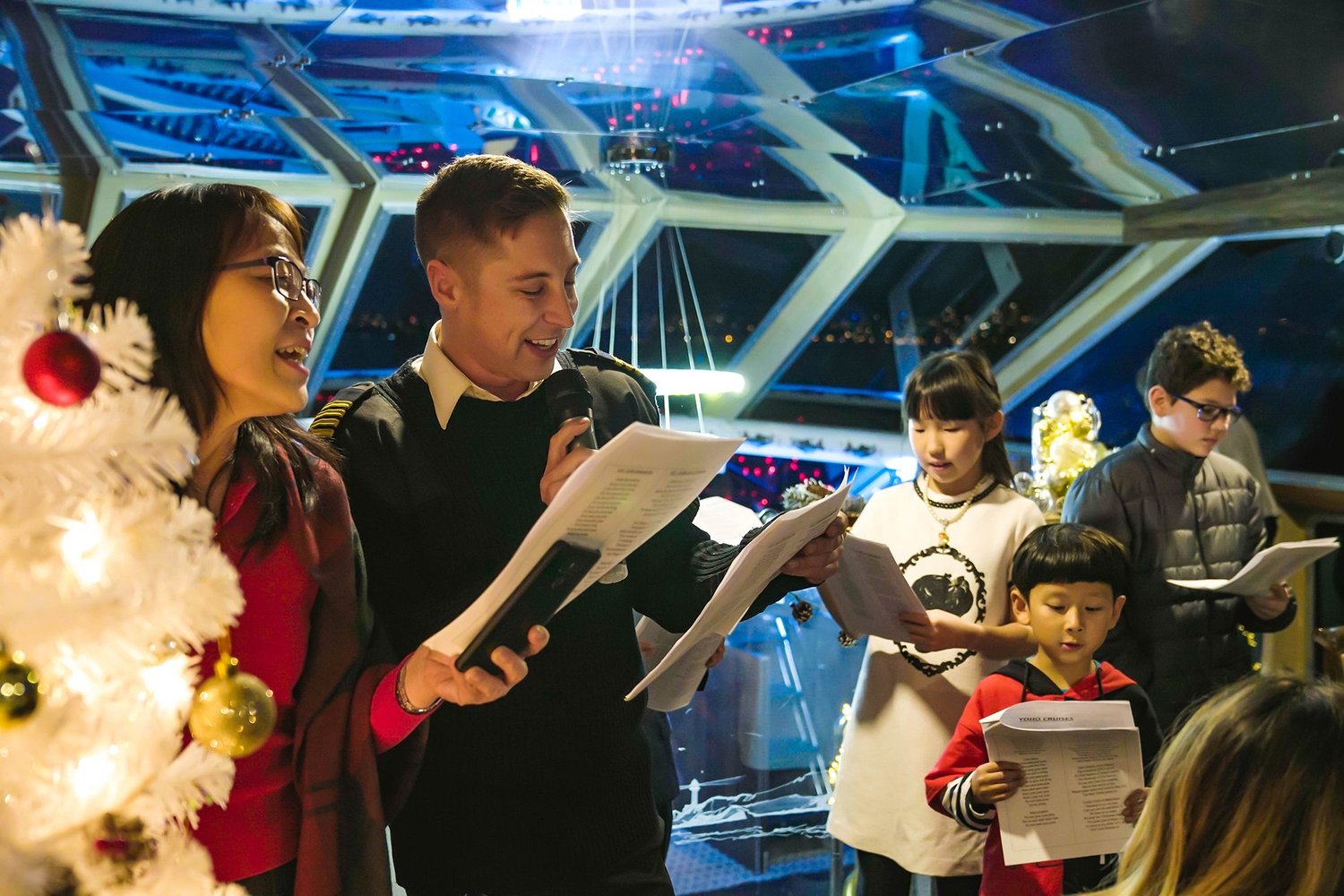 Guests celebrating the Christmas season aboard a cruise