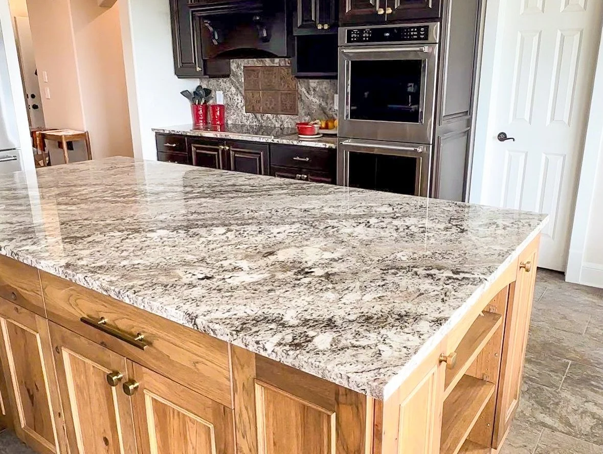 Designing kitchens that actually work for your life. 

This kitchen needed a better flow for how the family cooks and hosts. We reworked the layout, used most of the existing cabinetry, and added a larger island for more space + function. 

Small cha