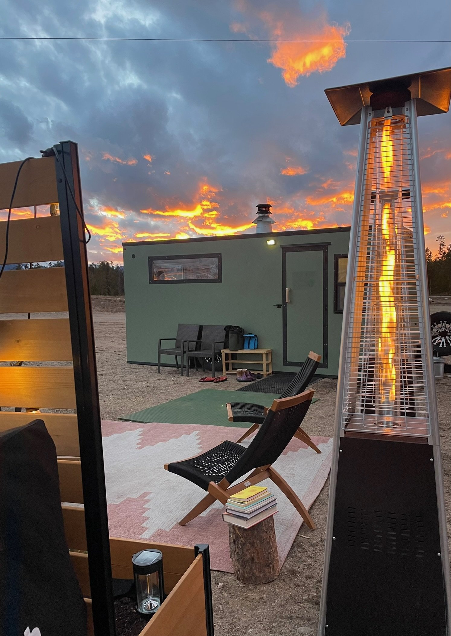 Sauna exterior with mountain setting and outdoor seating