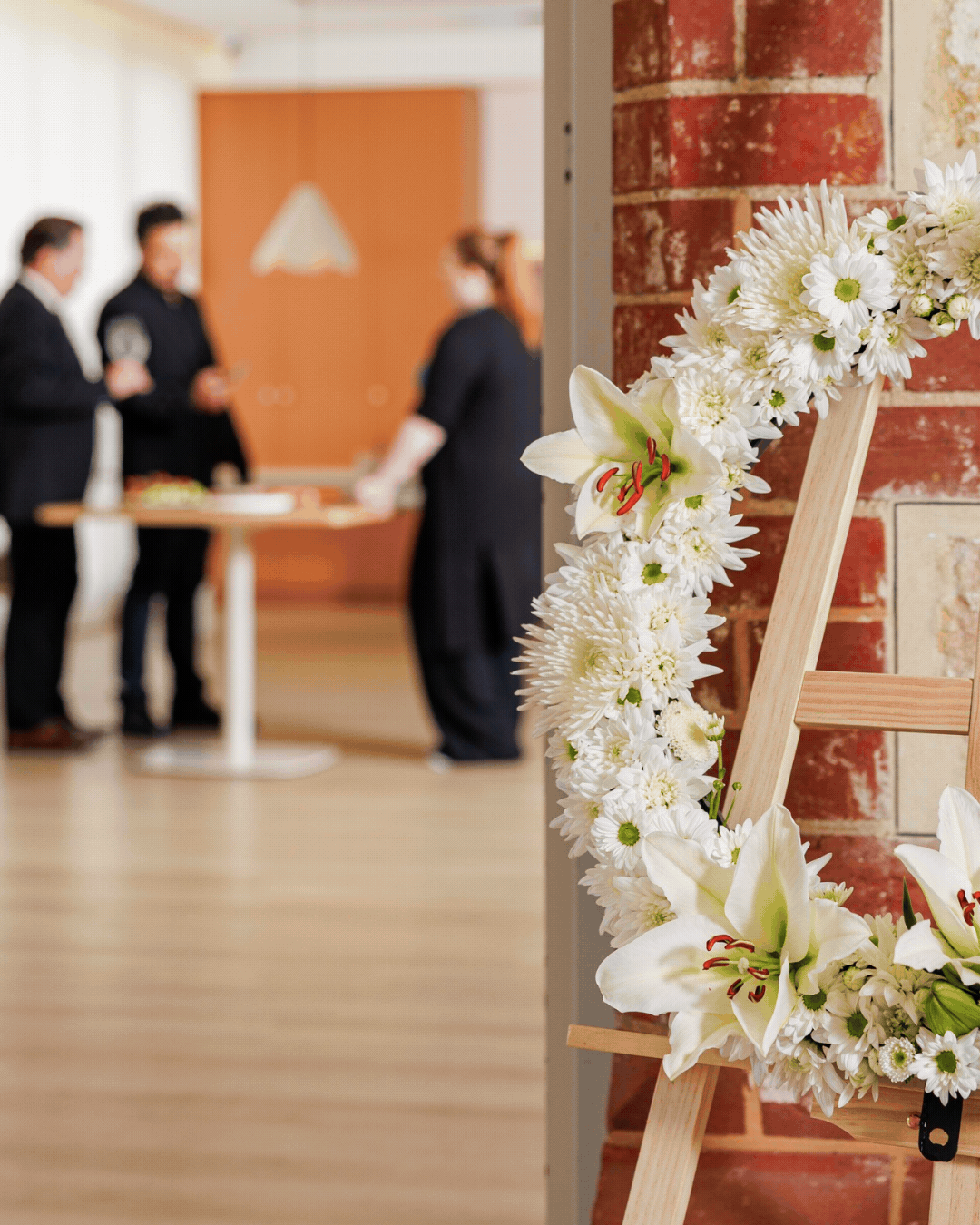 Photo of wake celebration gathering at The Hilton Hotel with friends sharing memories at a wake venue in Adelaide