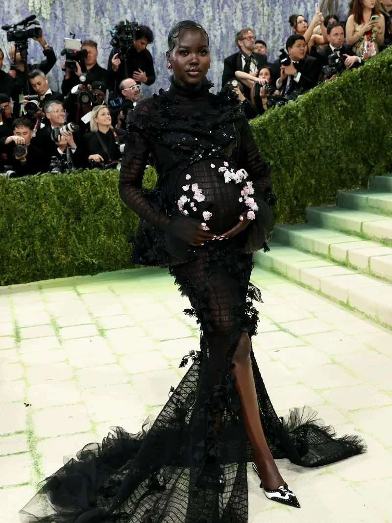 Adut Akech wearing custom Thom Browne