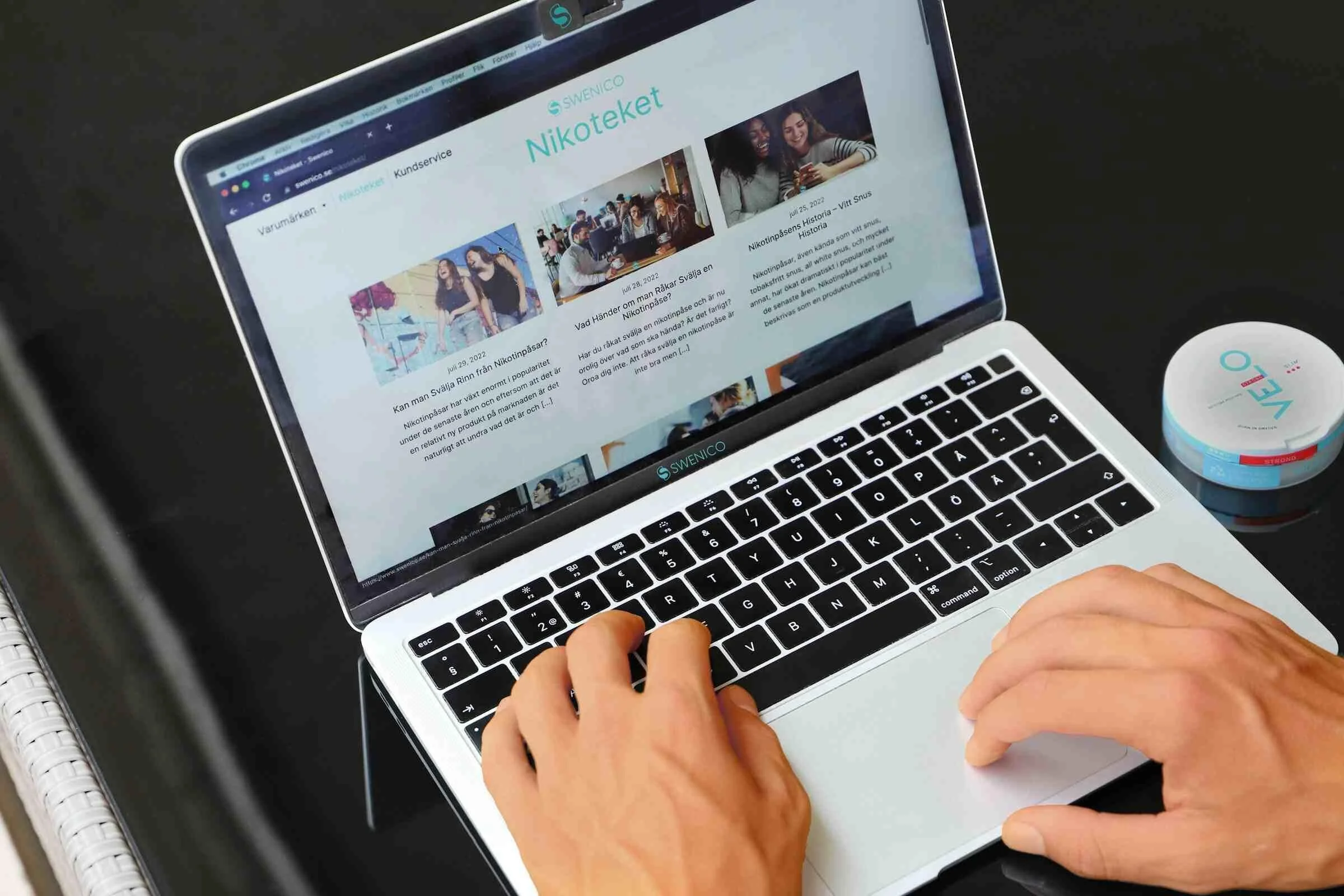 Close-up of hands typing on a laptop, representing the research men do quietly before admitting the pattern isn't going to fix itself. Zyns can shows coping strategies.