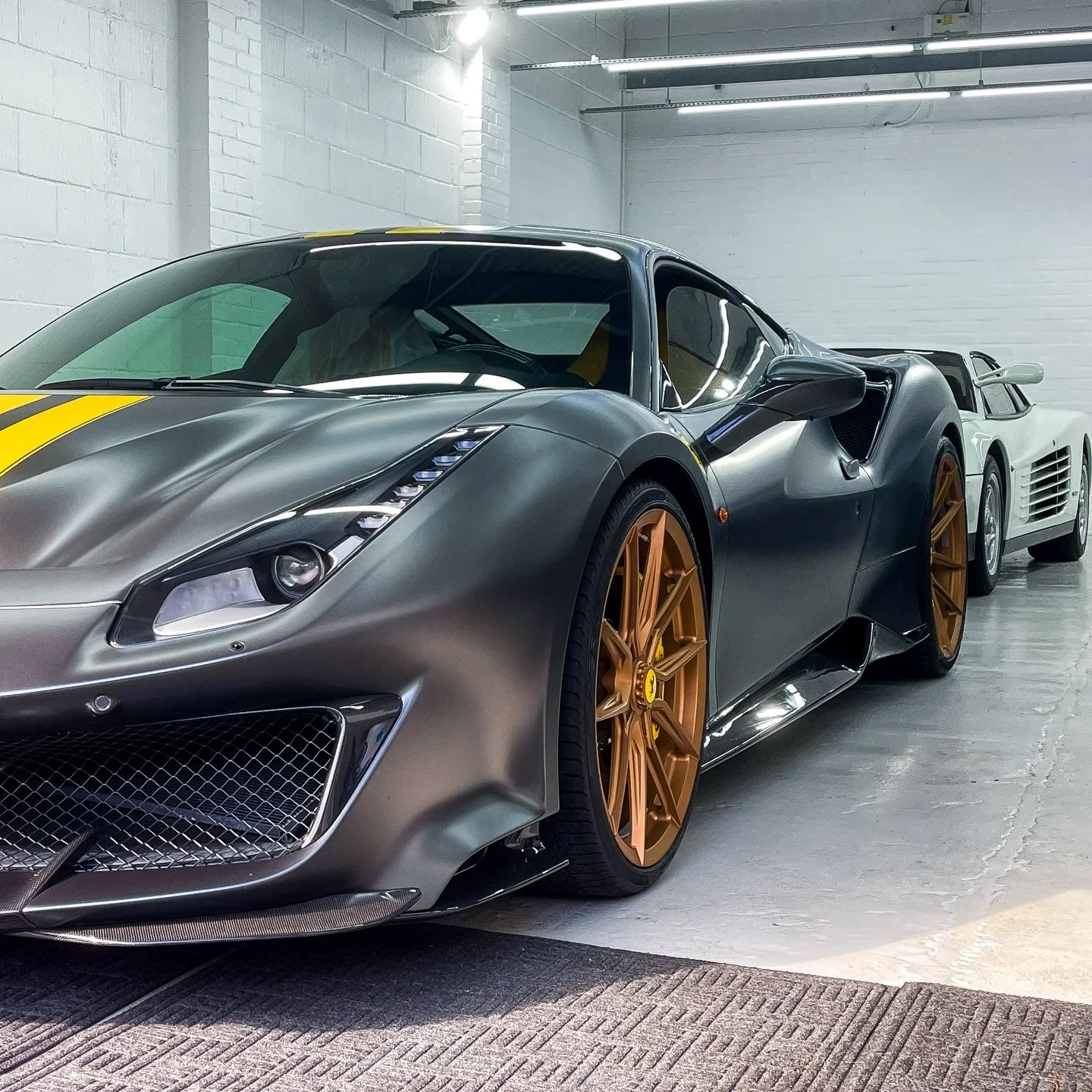 Proof that Ferrari knows exactly where to put the curves. 

We carried out a maintenance wash and engine bay clean on the heavy Gulf-spec Pista, along with an interior ceramic coating. In the background, the Testarossa received a full paint correctio