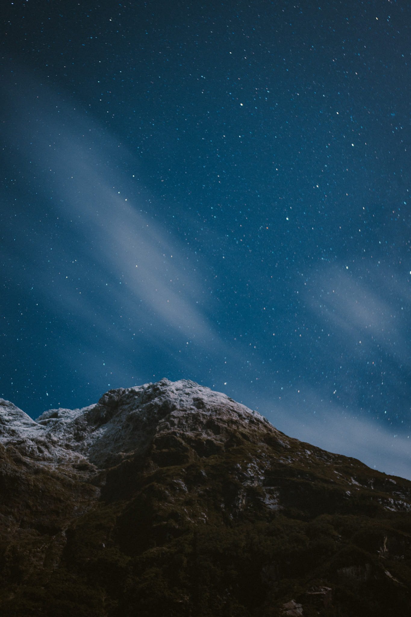Night sky with stars over the mountains at Milford Sound Lodge, Fiordland